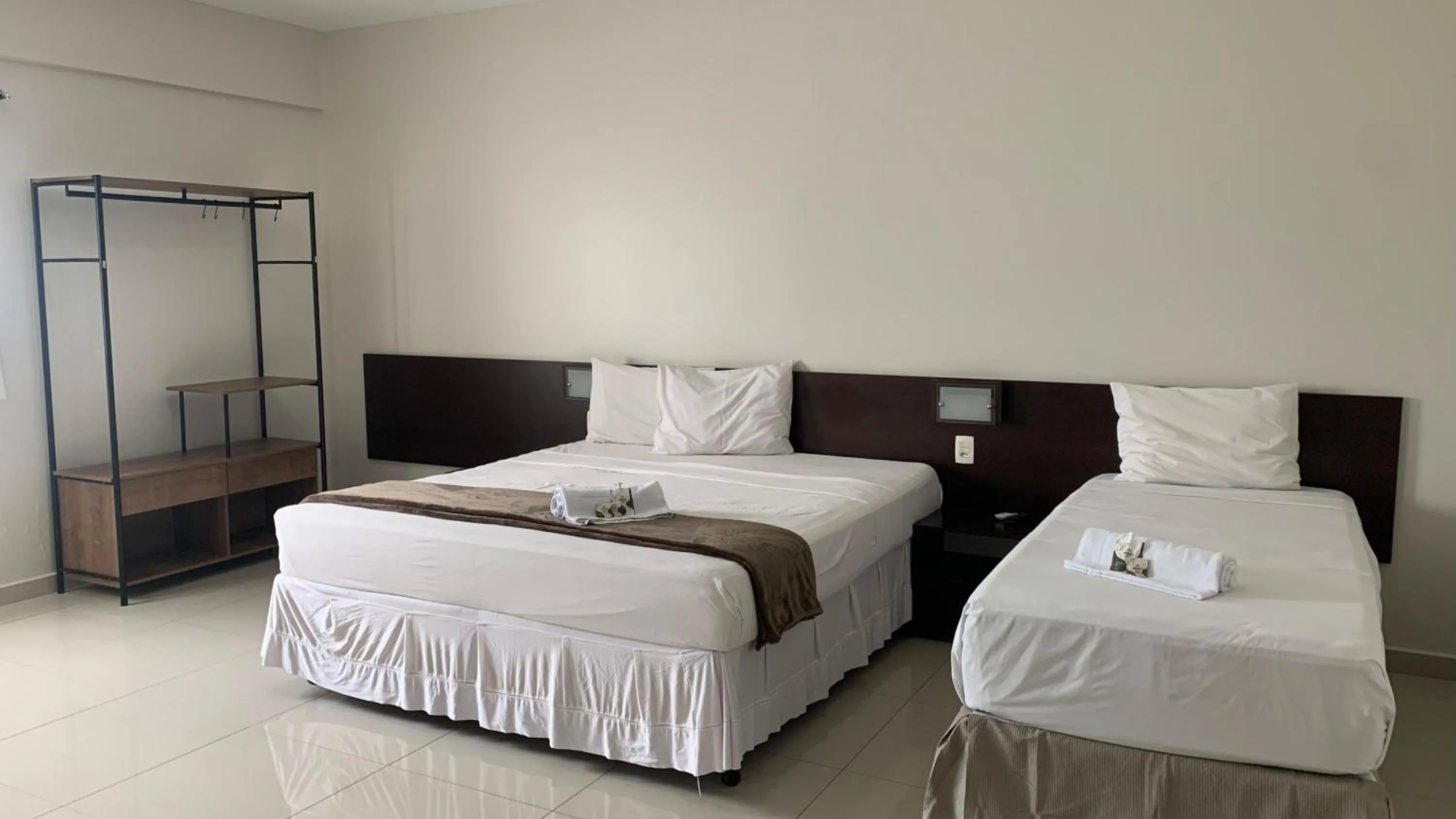 Bed in Atrium Express Hotels