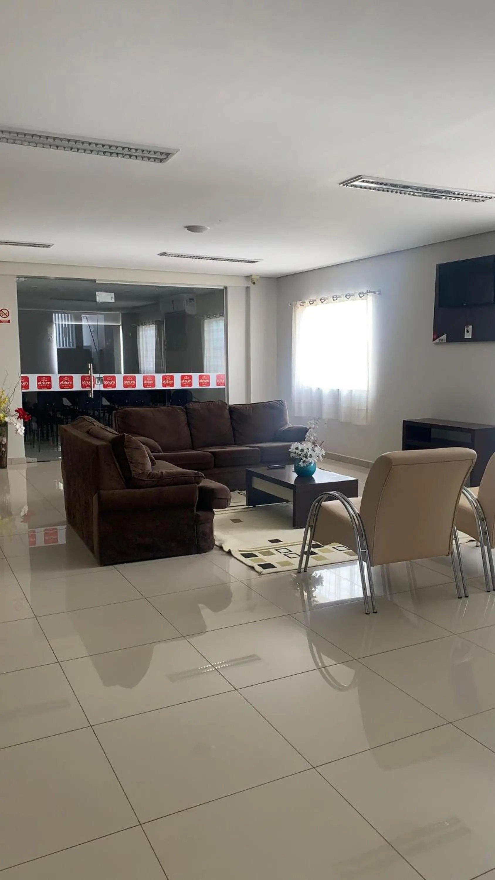 Seating area in Atrium Express Hotels