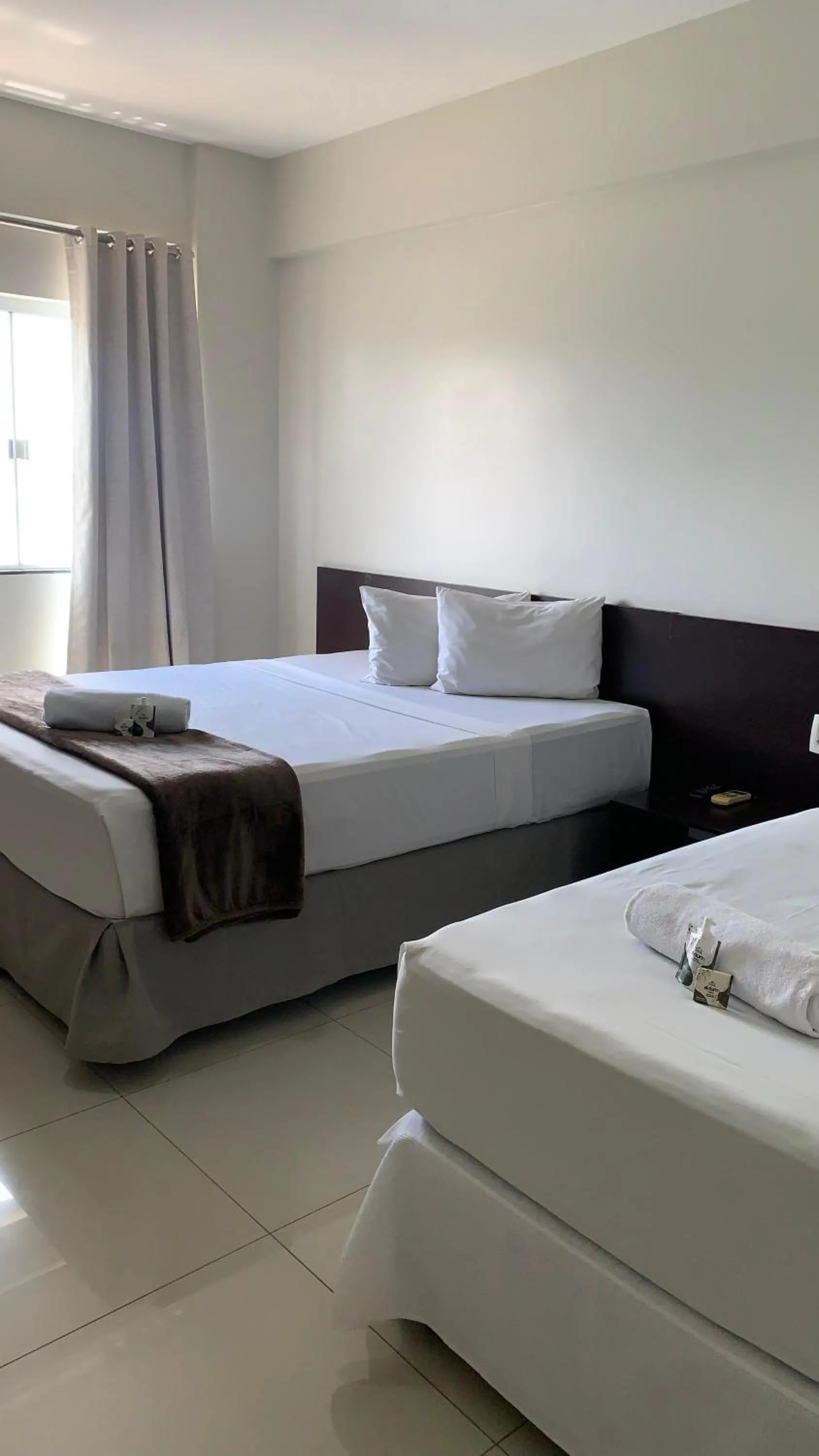 Bed in Atrium Express Hotels