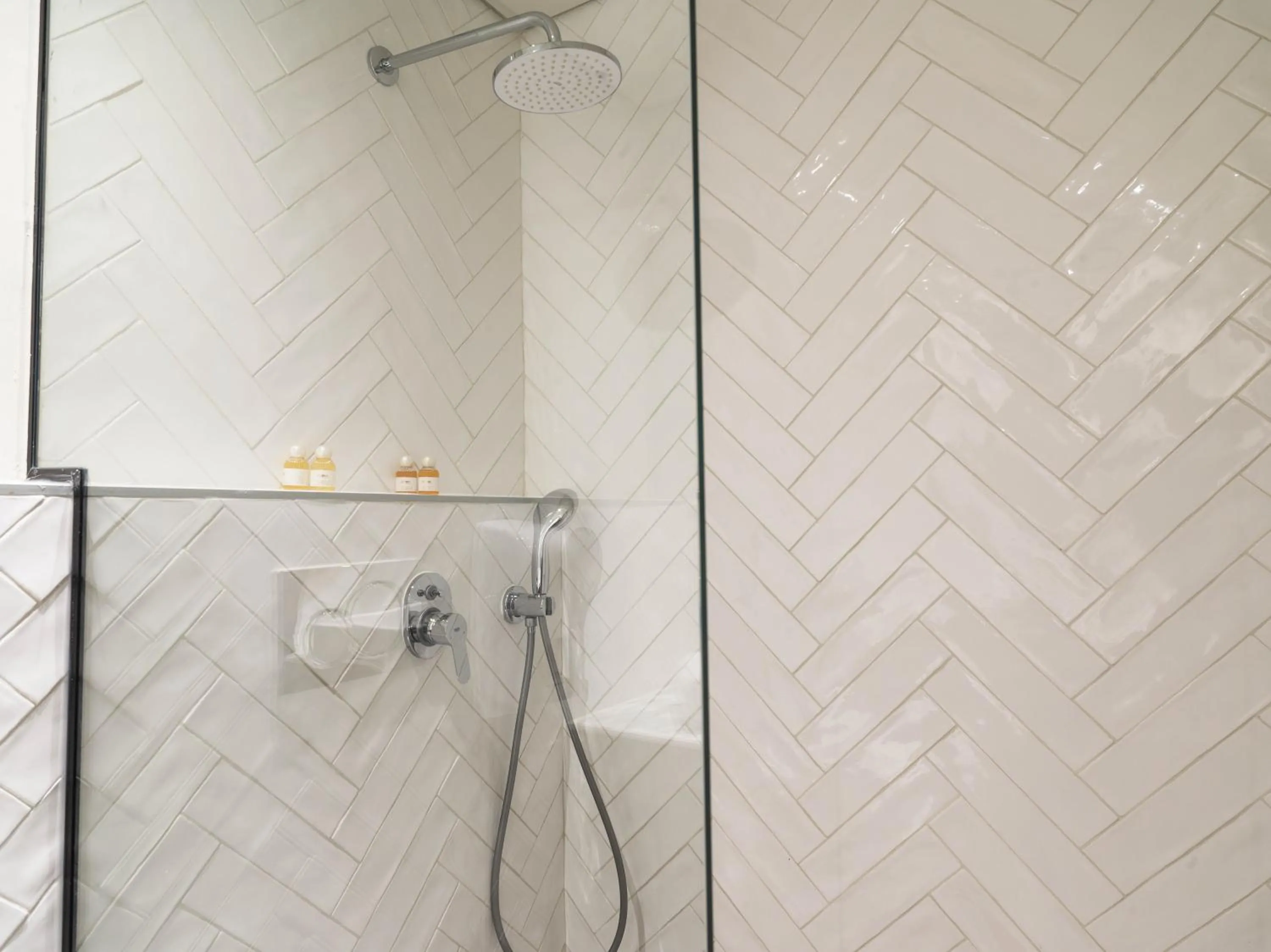 Shower in LIV The City Suites ADULTS ONLY