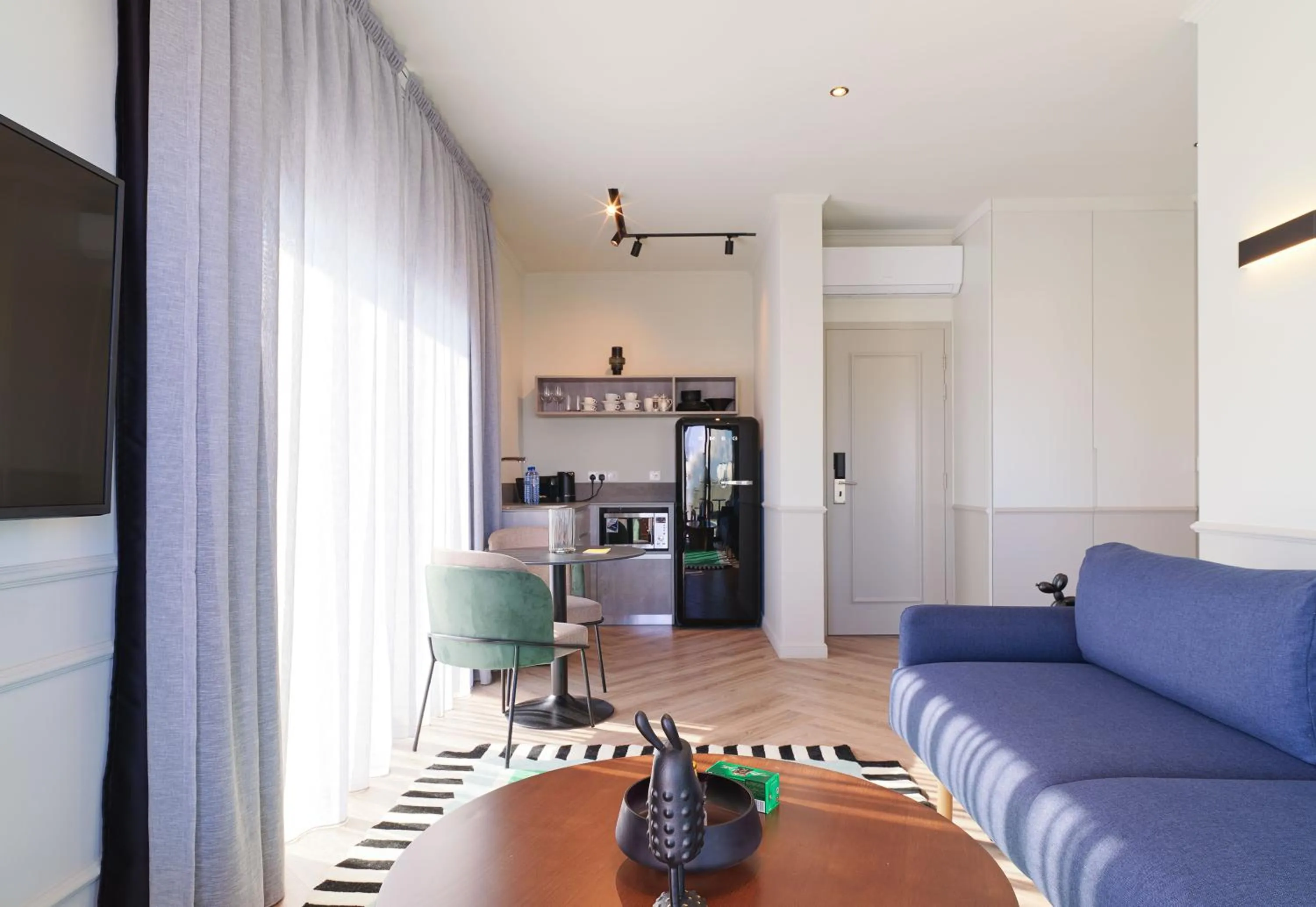 Kitchen or kitchenette in LIV The City Suites ADULTS ONLY