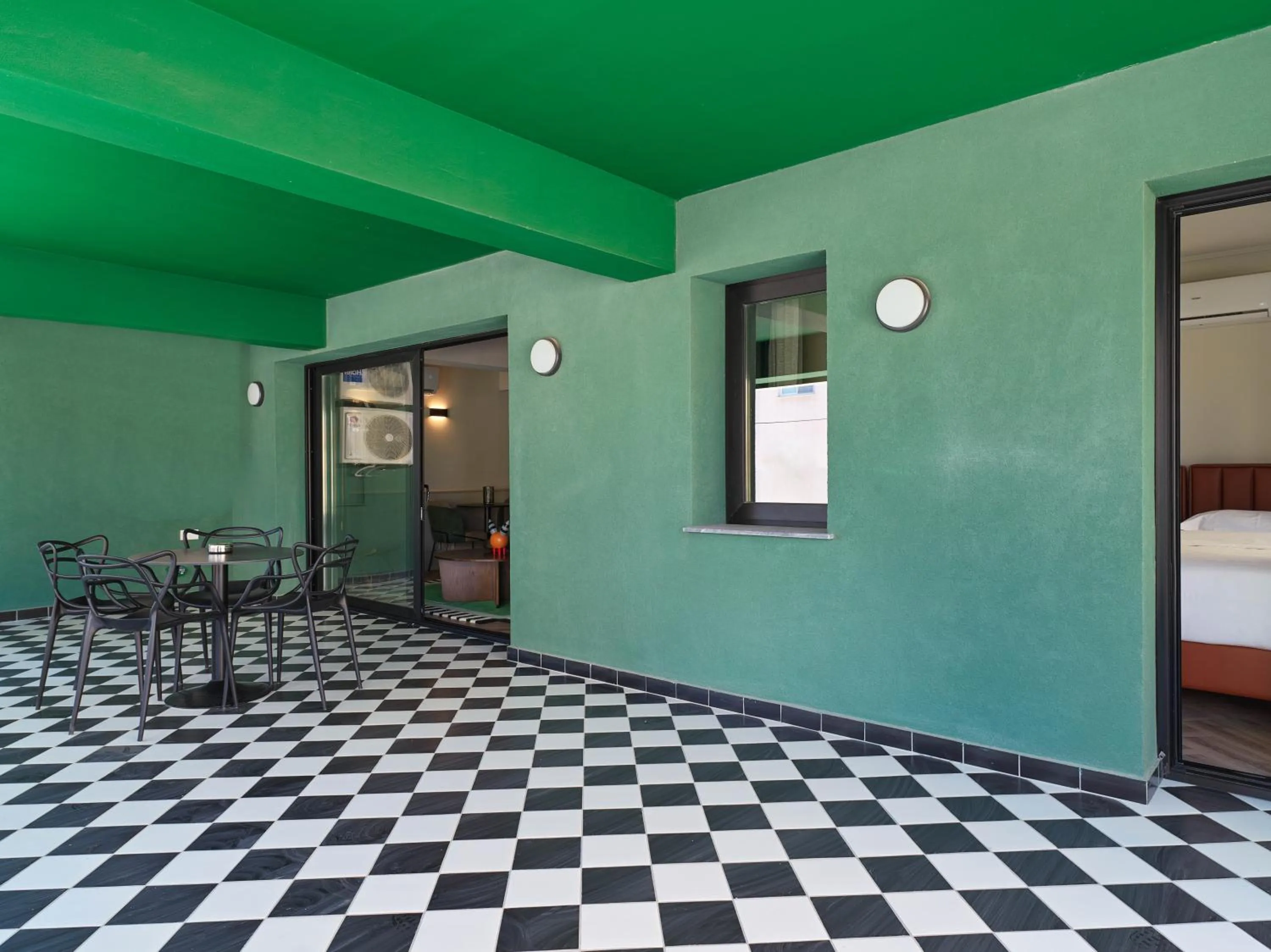 Patio, Bed in LIV The City Suites ADULTS ONLY