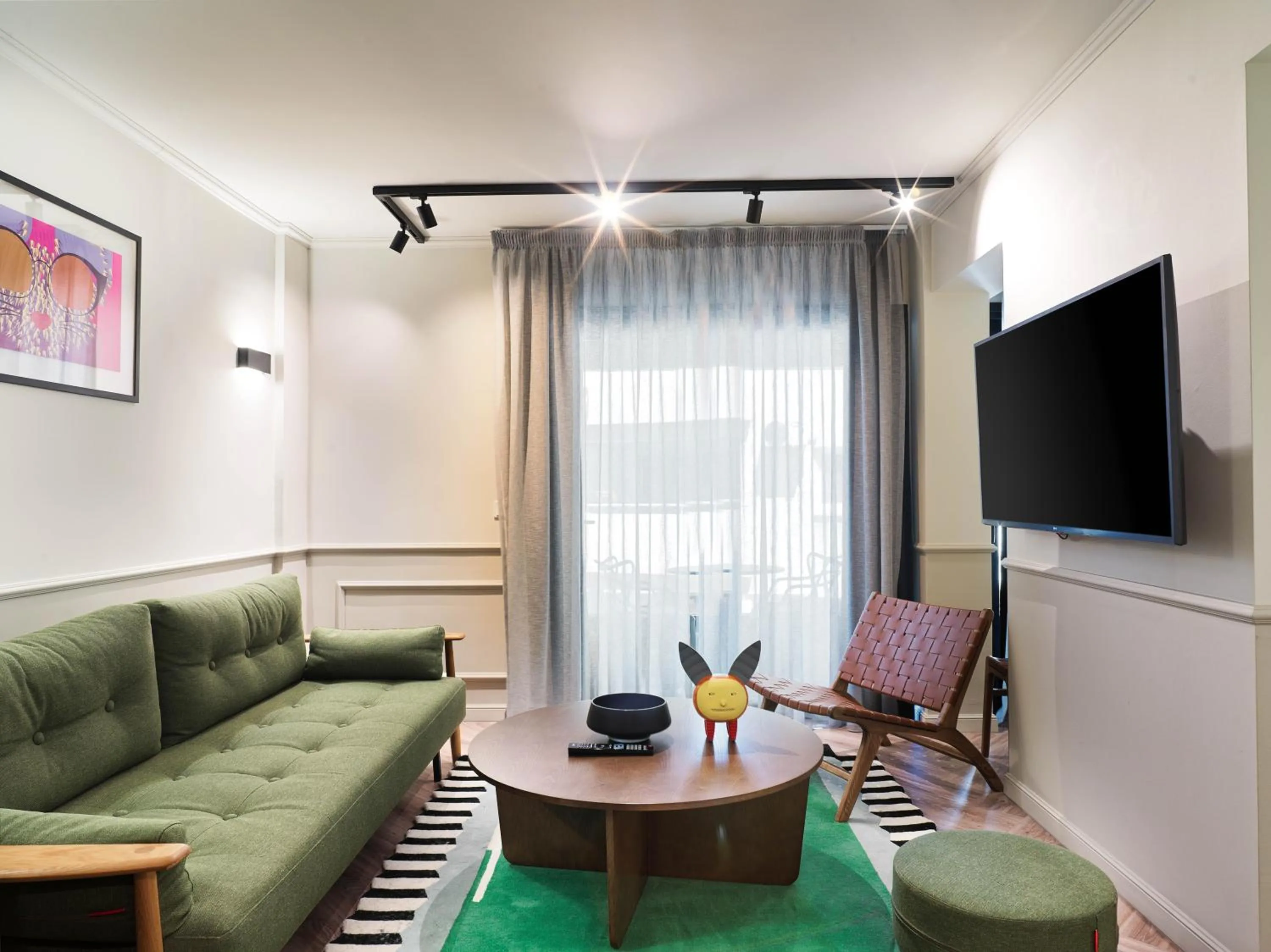 Seating area in LIV The City Suites ADULTS ONLY