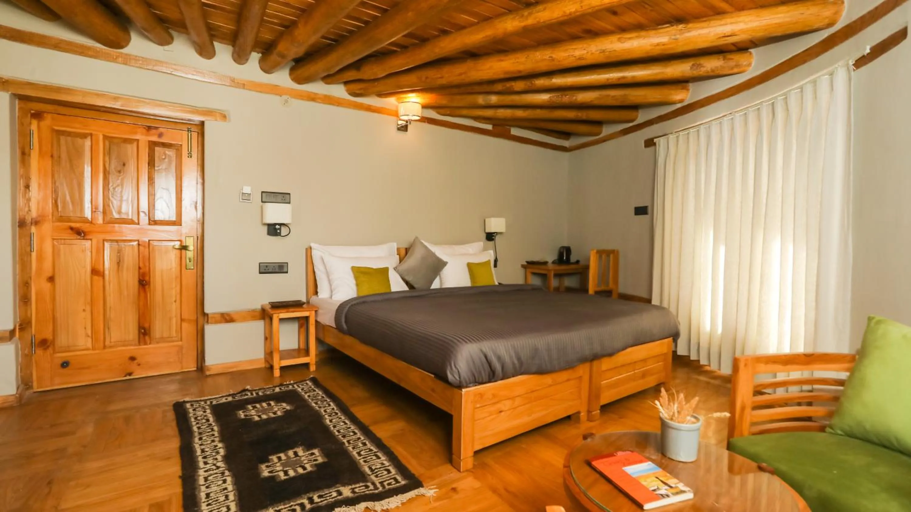 Photo of the whole room, Bed in Dakpa House Ladakh