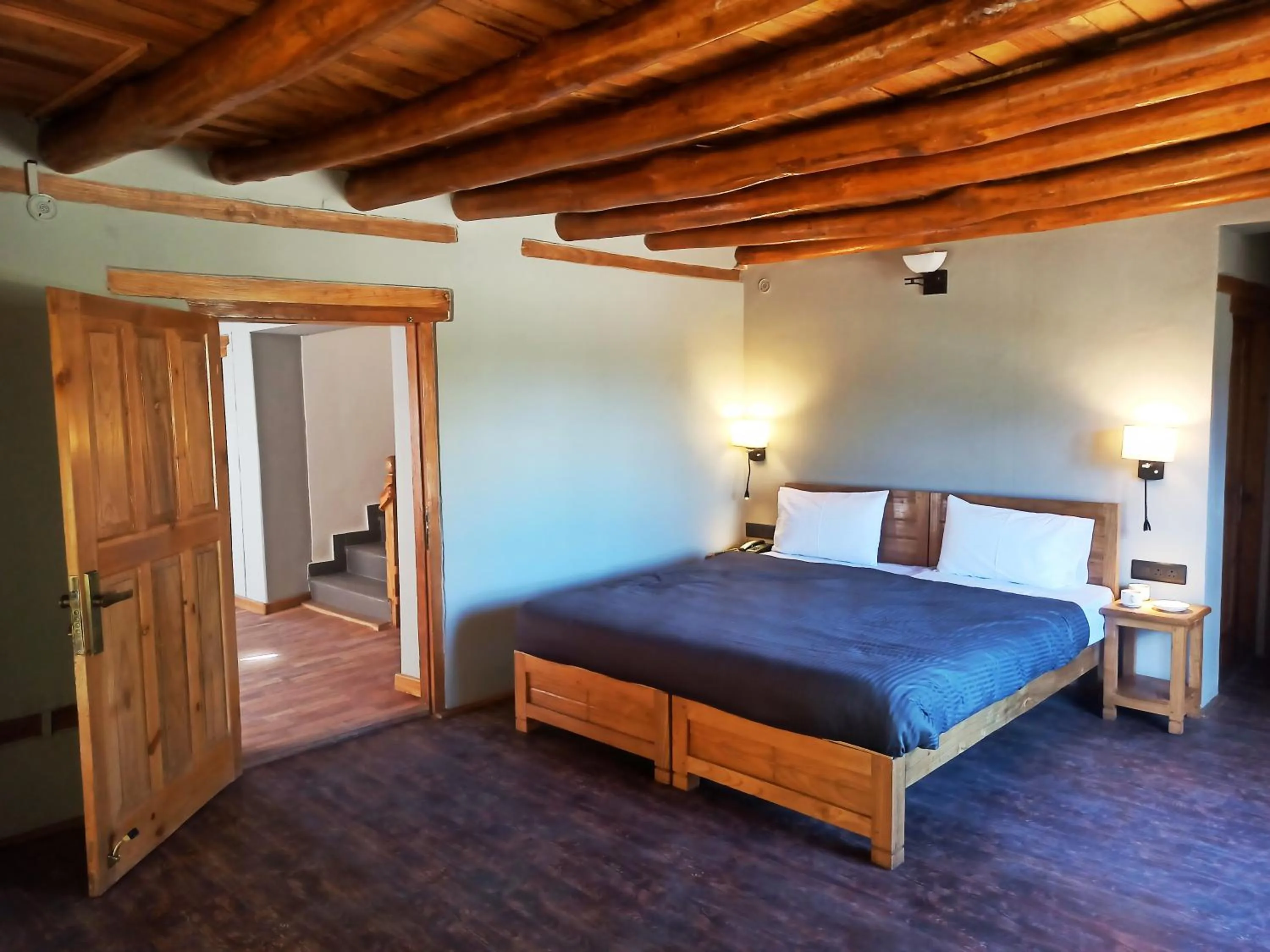 Photo of the whole room, Bed in Dakpa House Ladakh