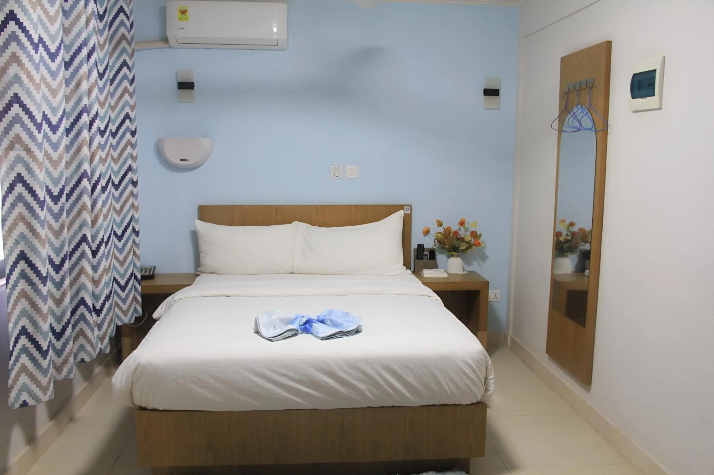 Bedroom in Canwin Hotel