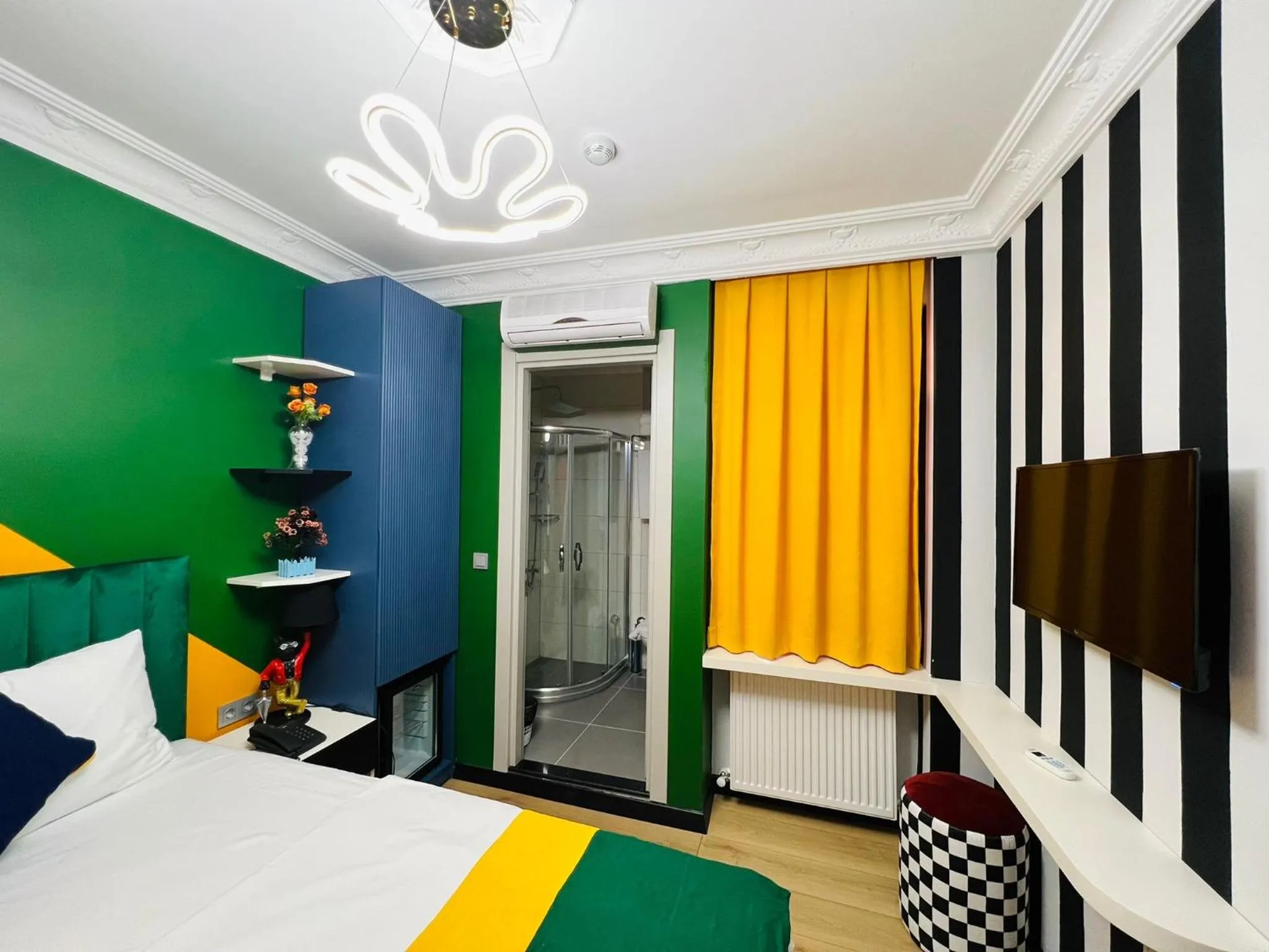 Bedroom in Apex Hotel