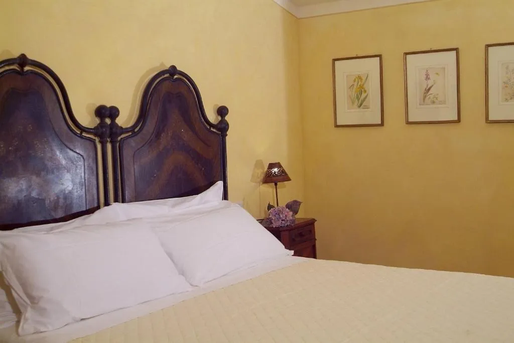 Photo of the whole room, Bed in La Tavola Dei Cavalieri
