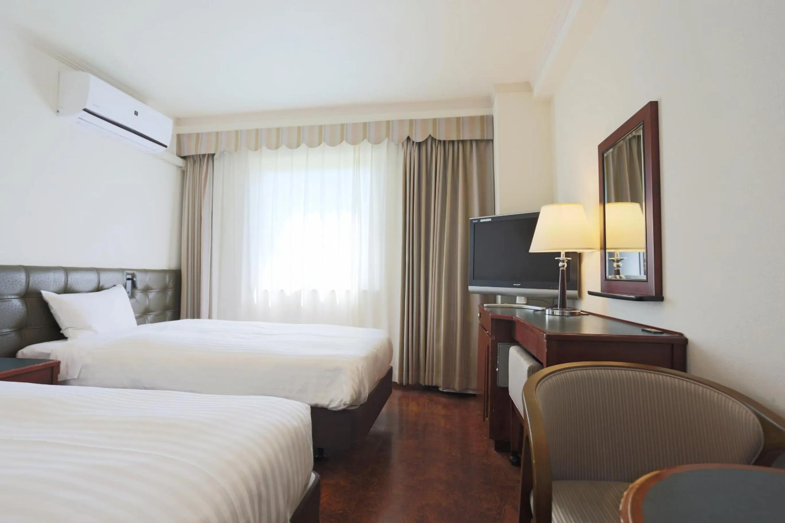 Photo of the whole room, Bed in Hotel Castle Inn Suzuka Chuo