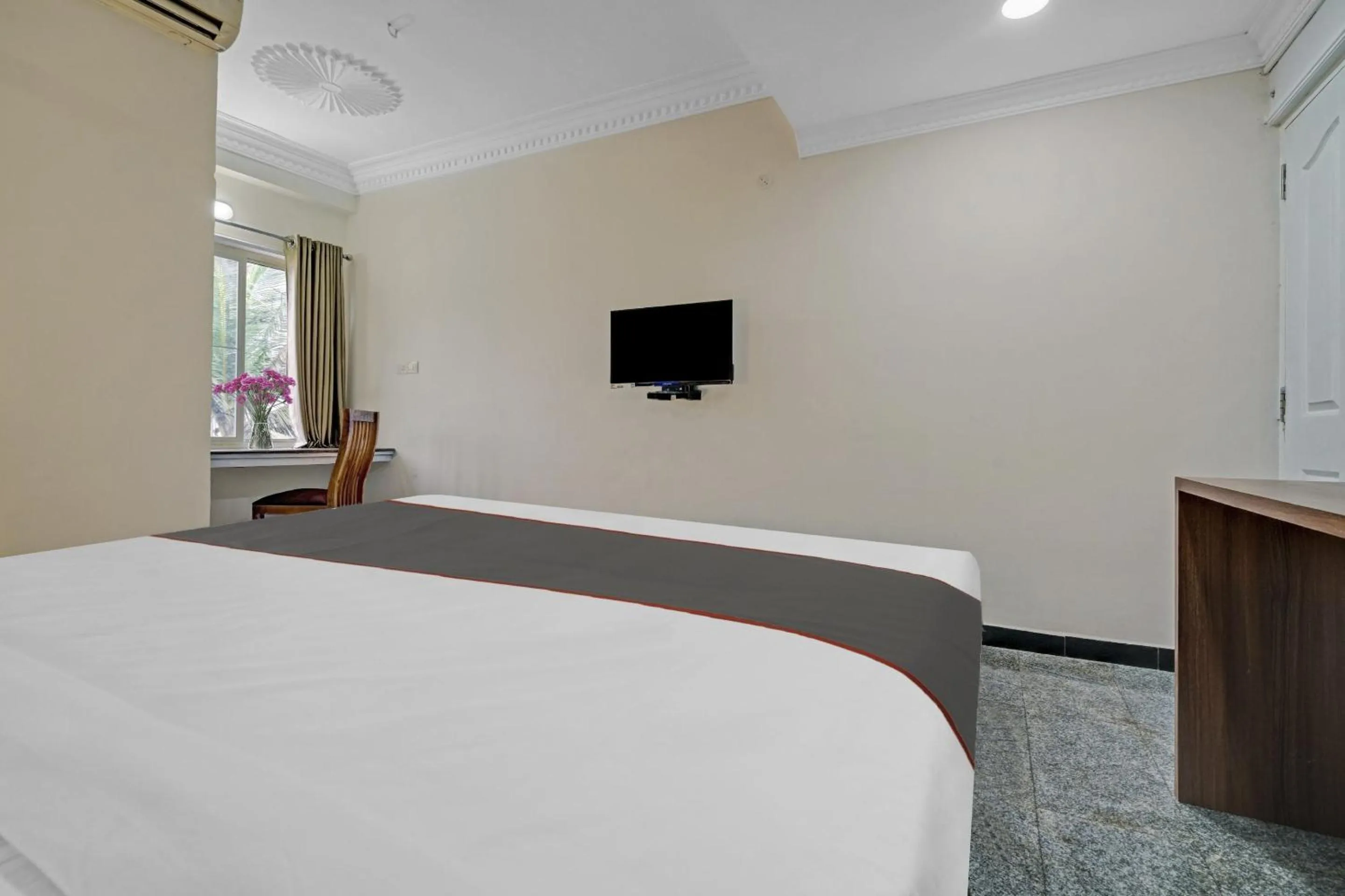 Bedroom, Bed in Capital O Rayan Plaza