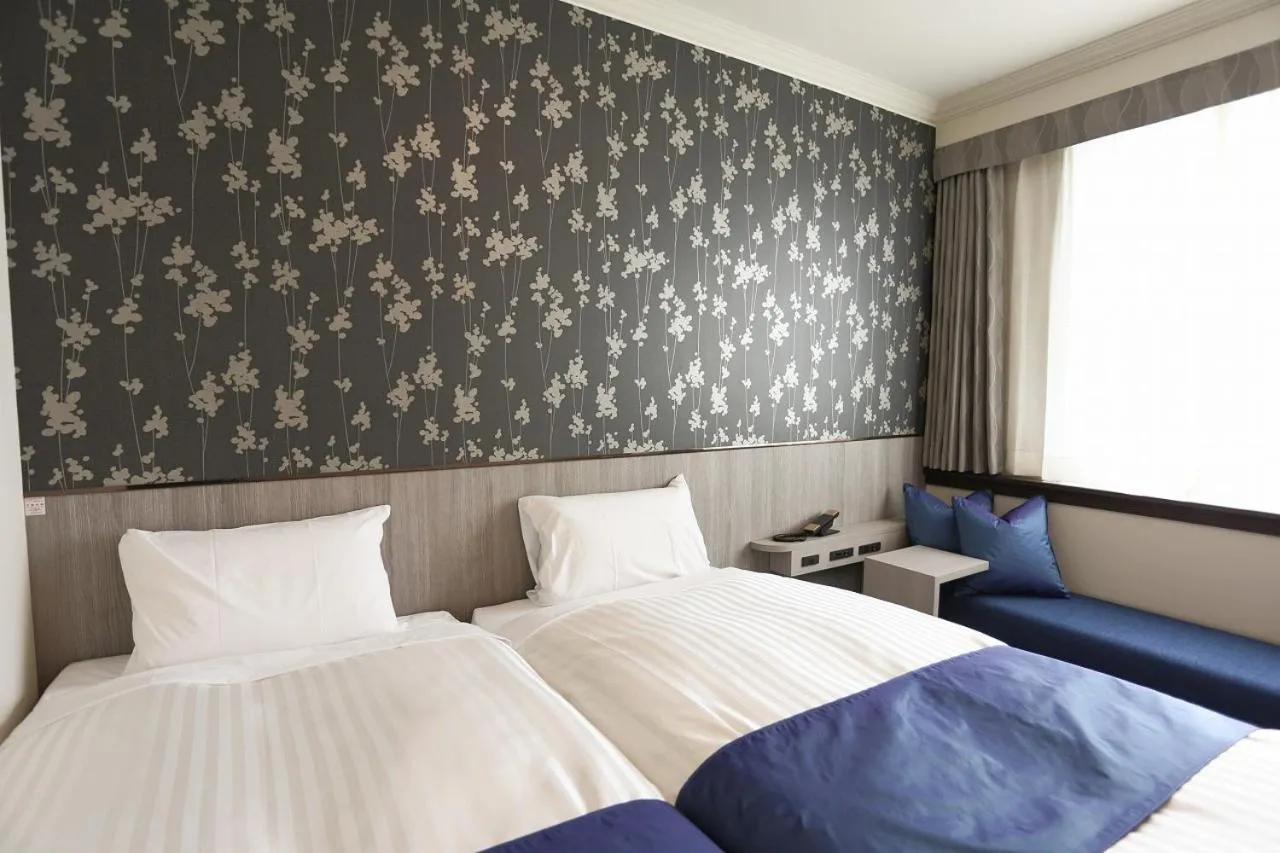 Bed in Hotel Castle Inn Tsu