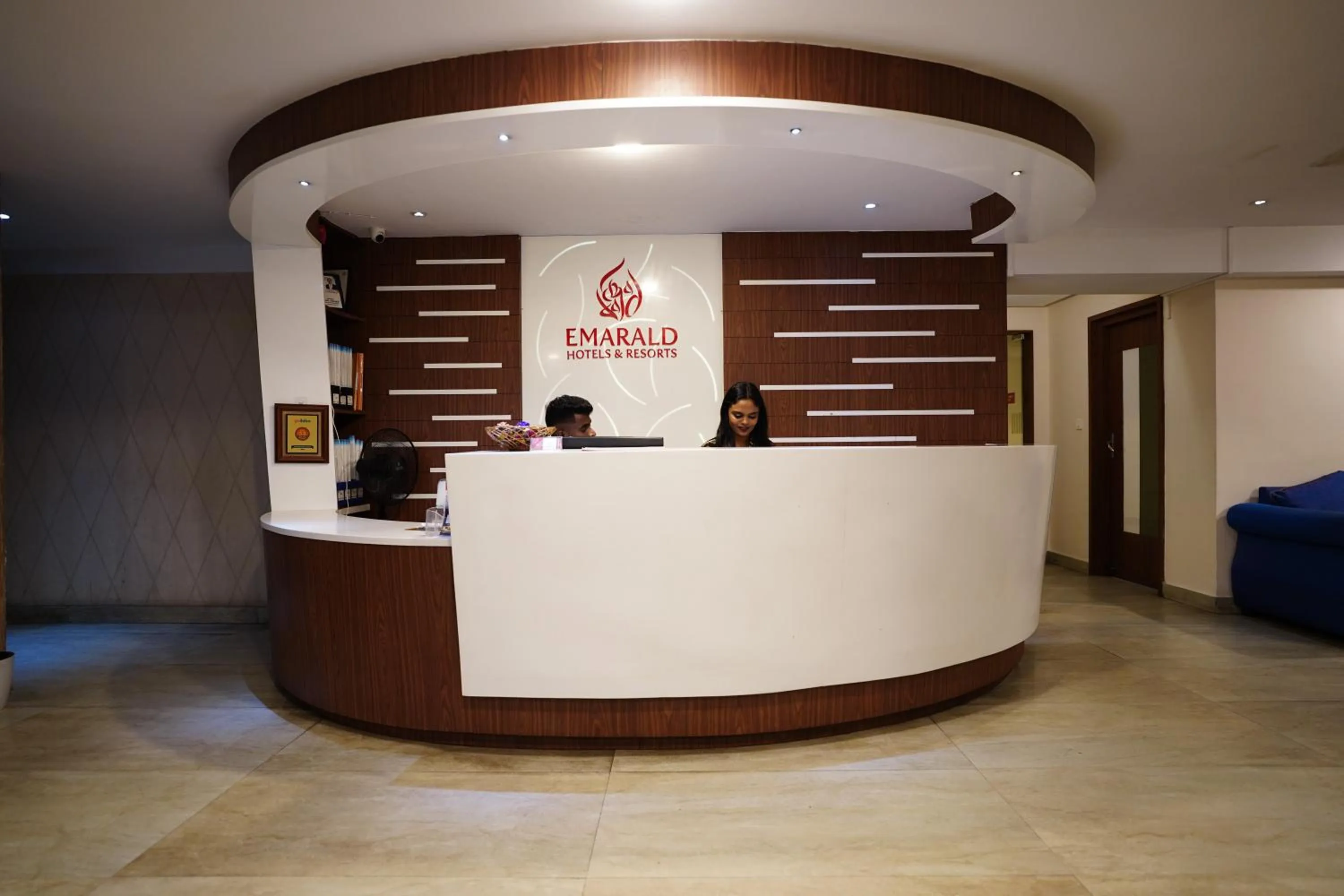 Property logo or sign in Emarald Hotel Calicut