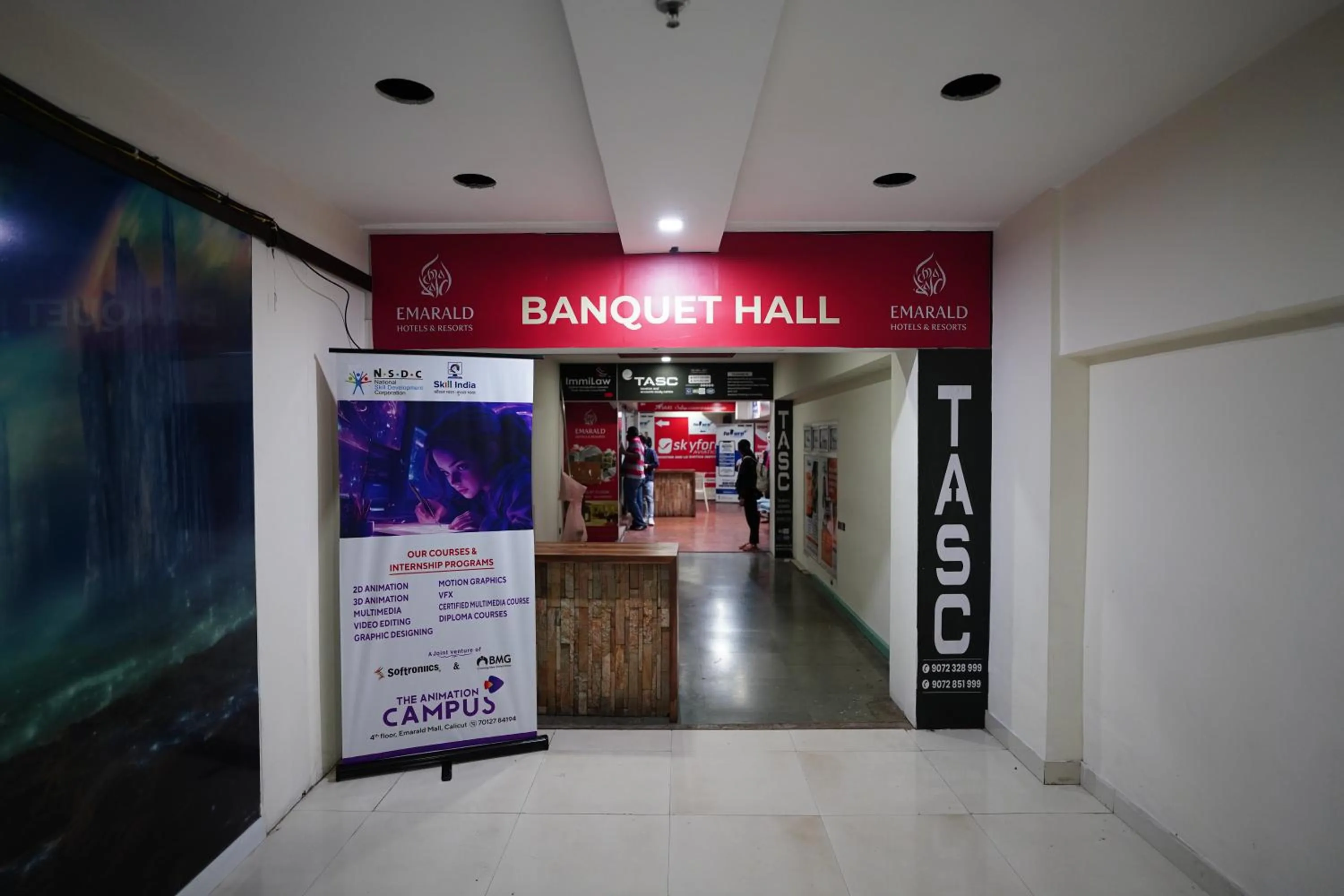 Property logo or sign in Emarald Hotel Calicut