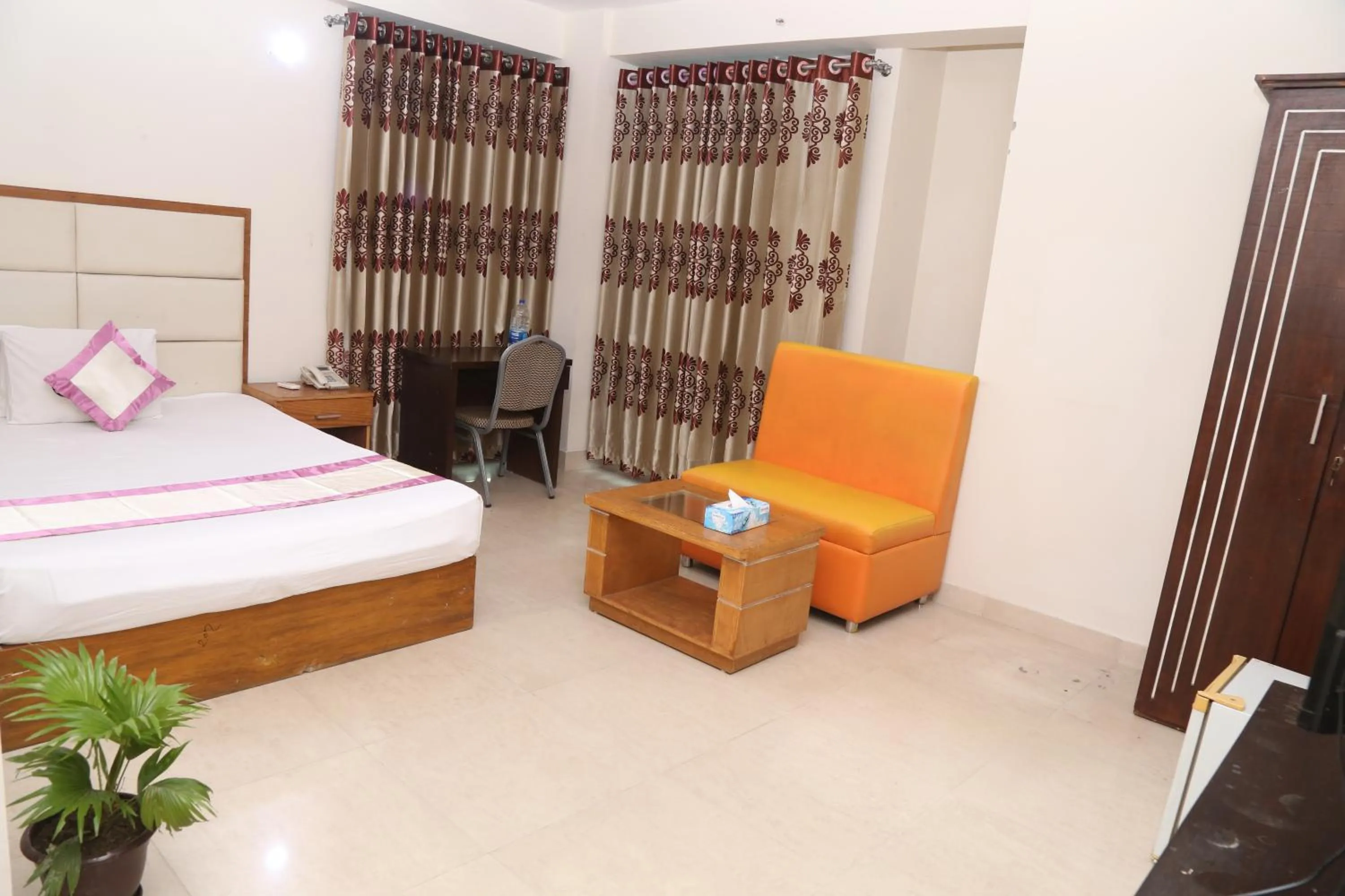 Bed in Platinum Hotel Ltd