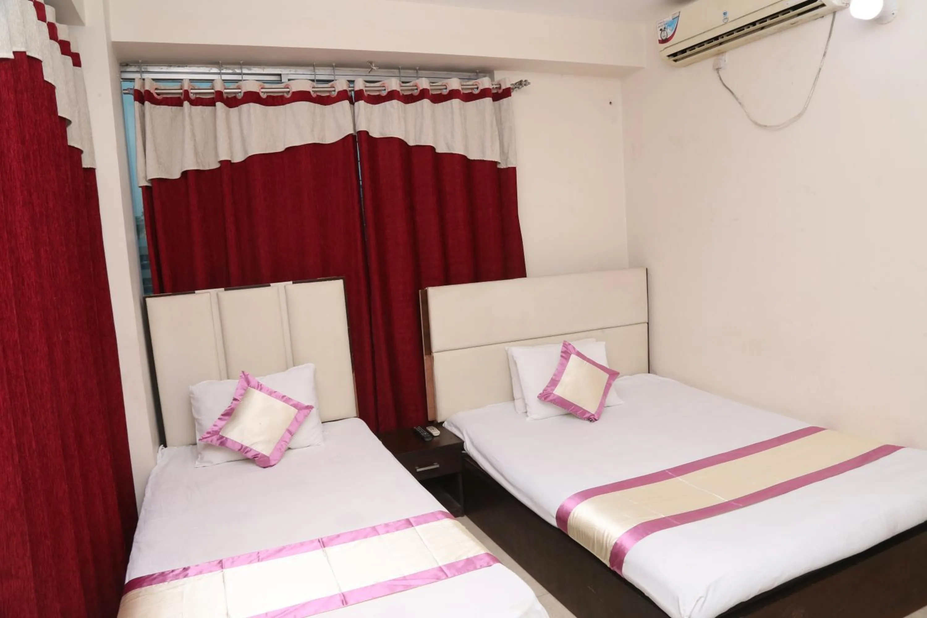 Bed in Platinum Hotel Ltd