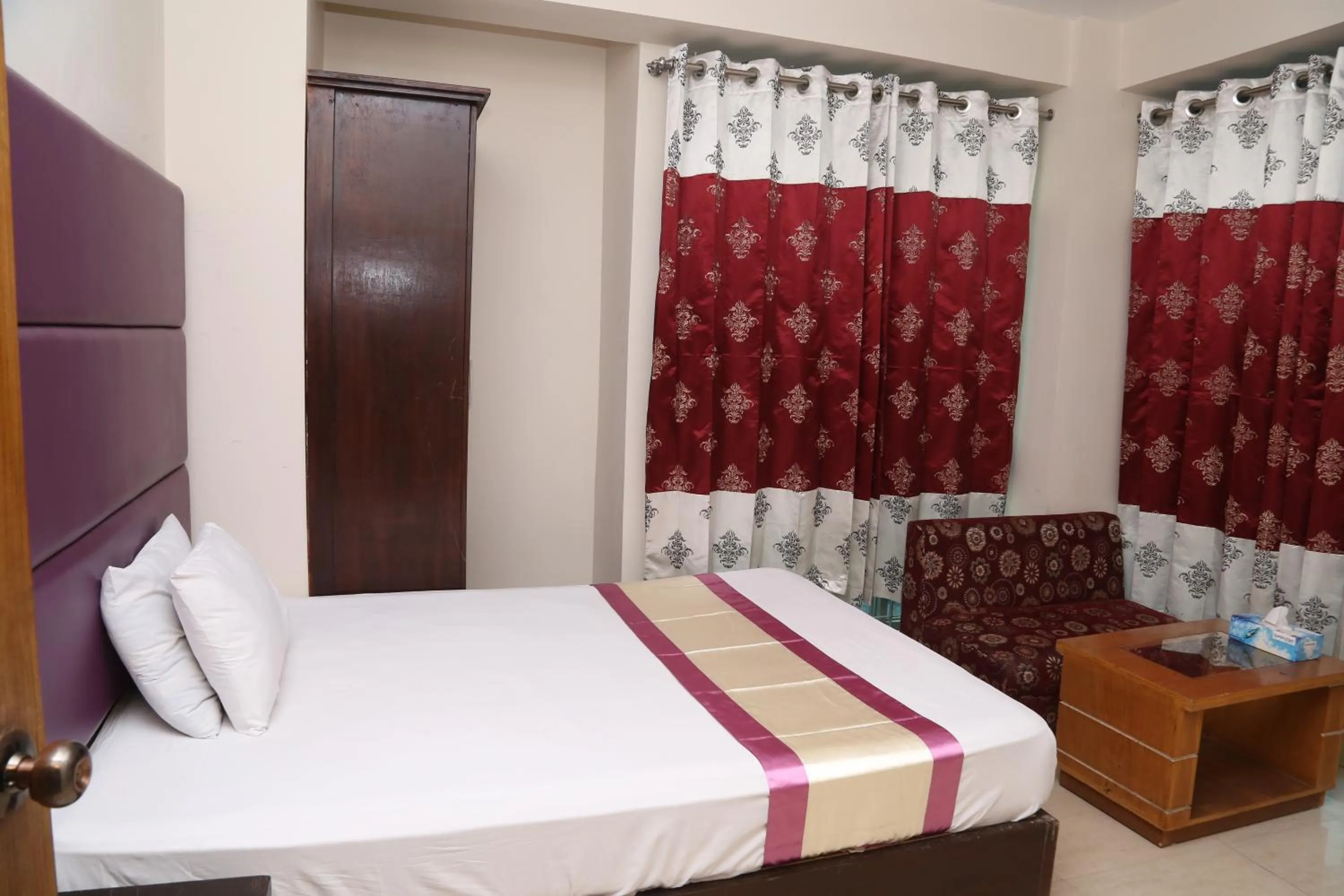 Bed in Platinum Hotel Ltd