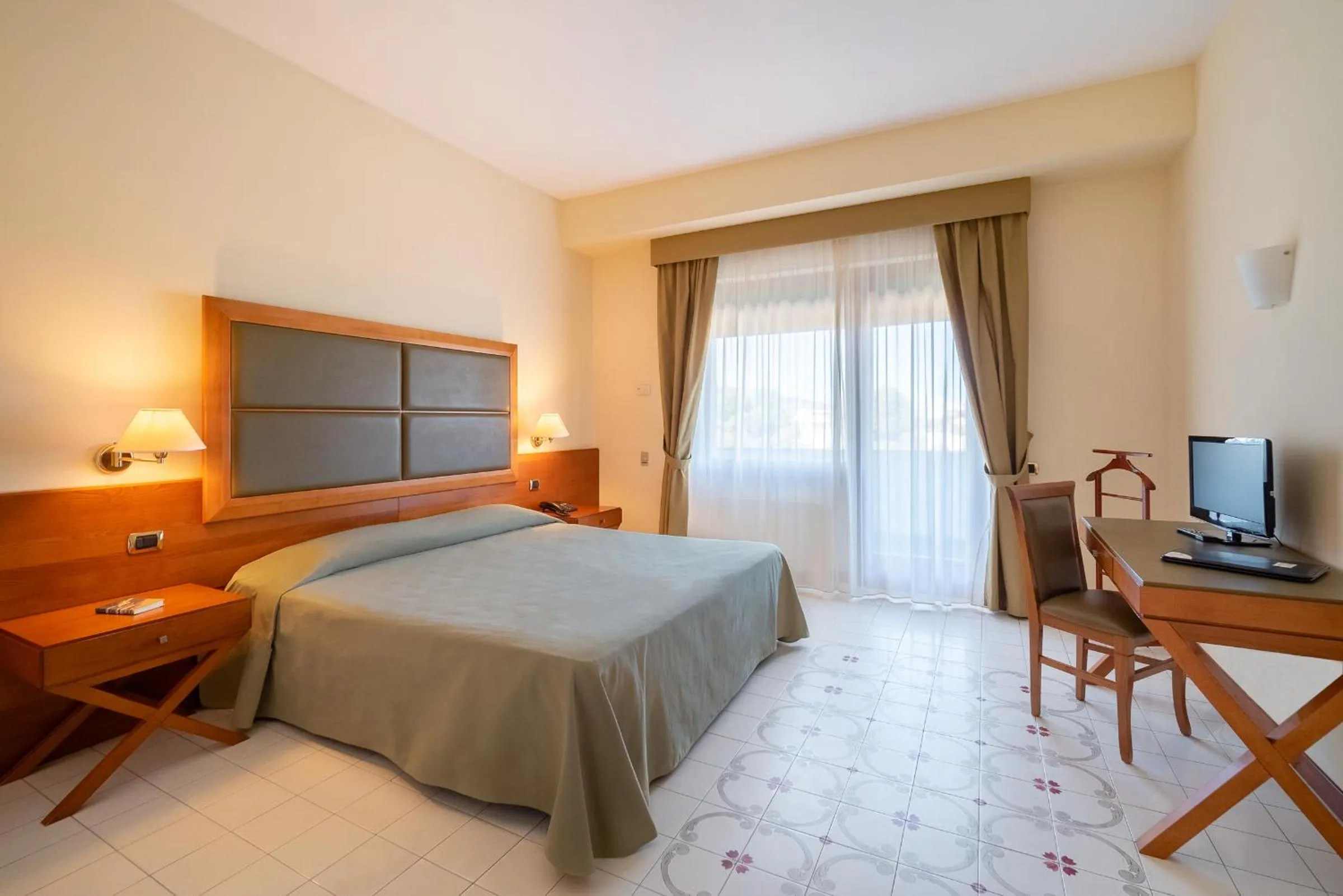 Bed in Grand Hotel Don Juan