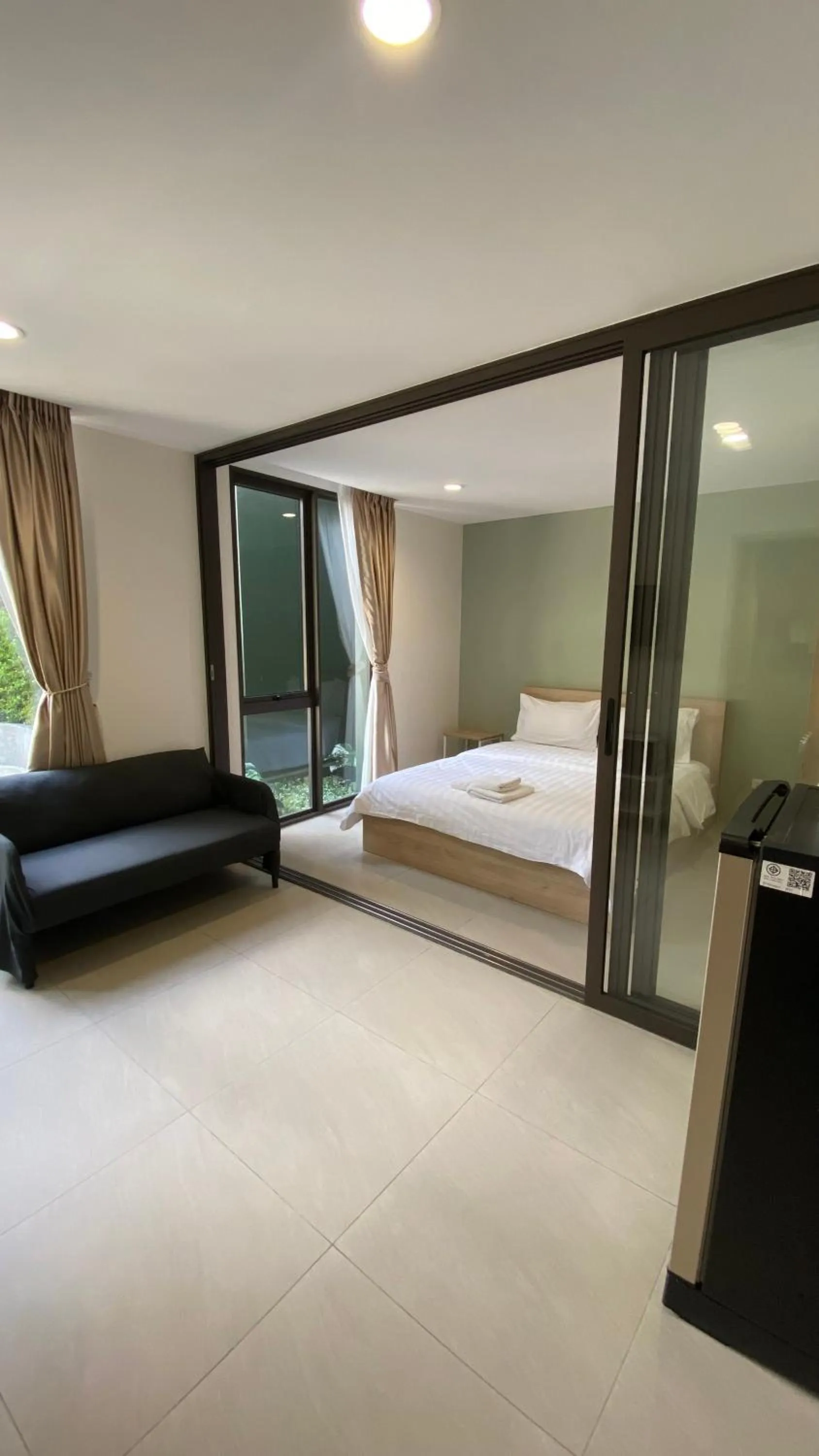 Bed in POP Heritage Residence