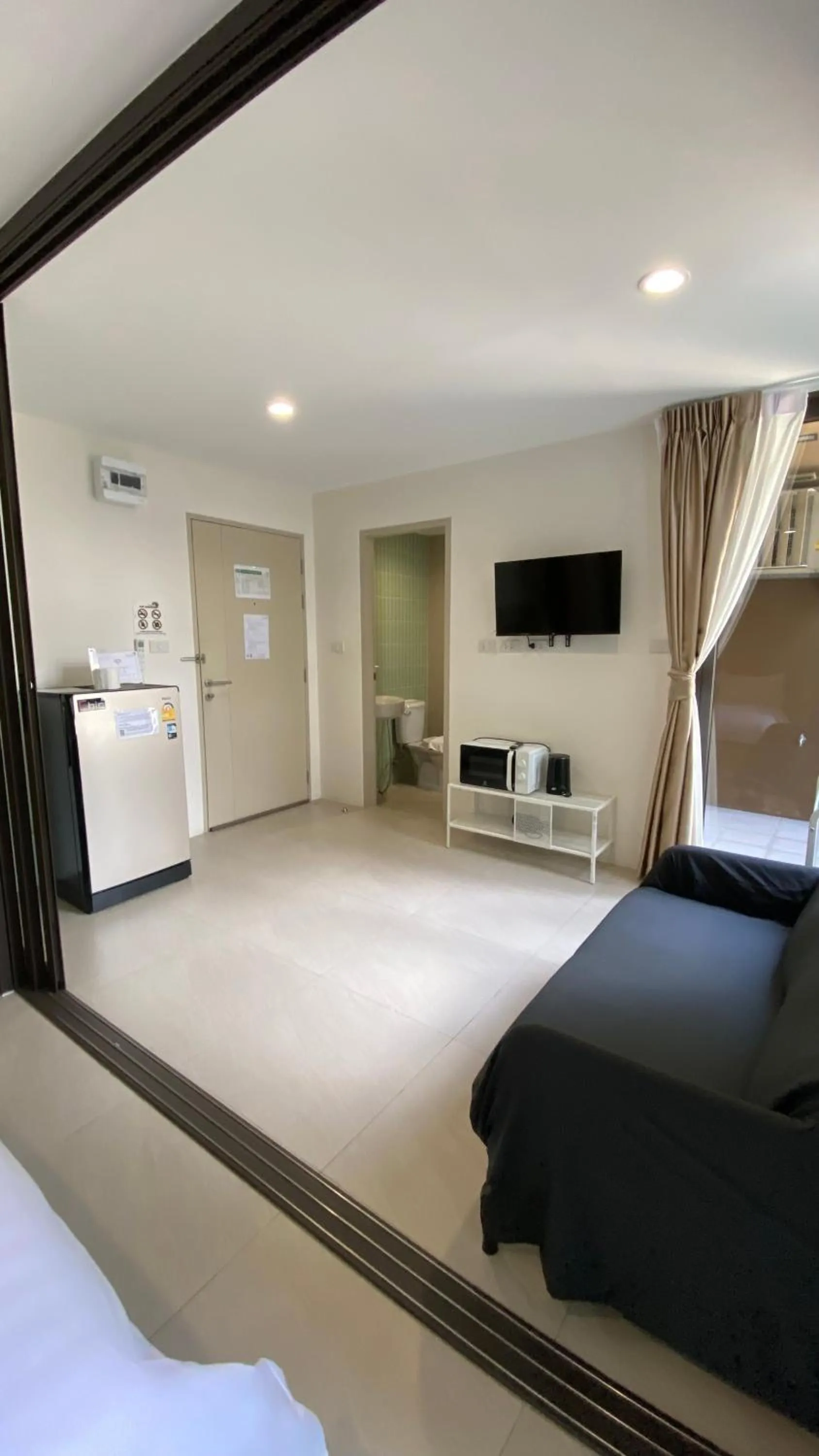 Living room, Bed in POP Heritage Residence