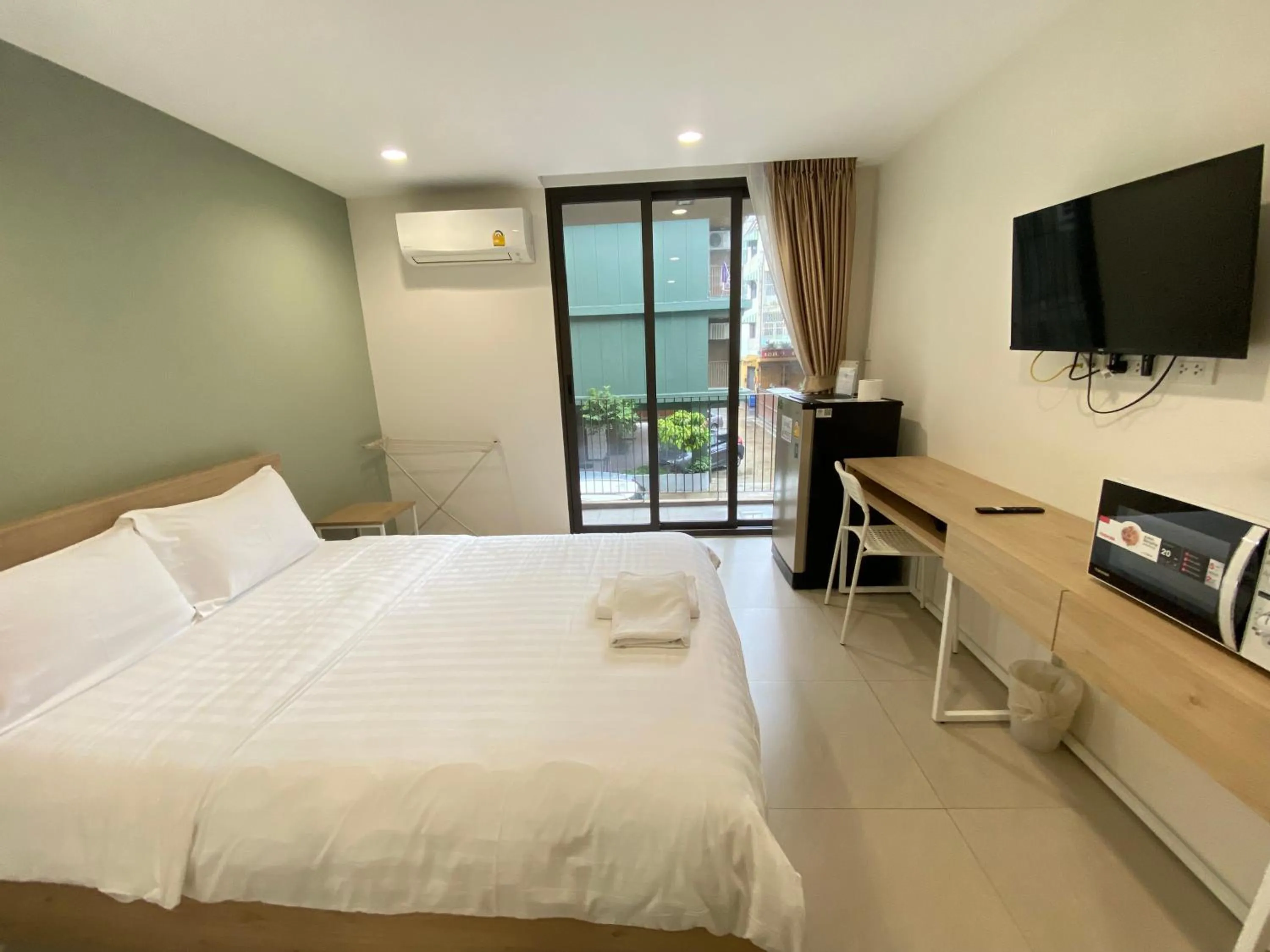 Bed in POP Heritage Residence