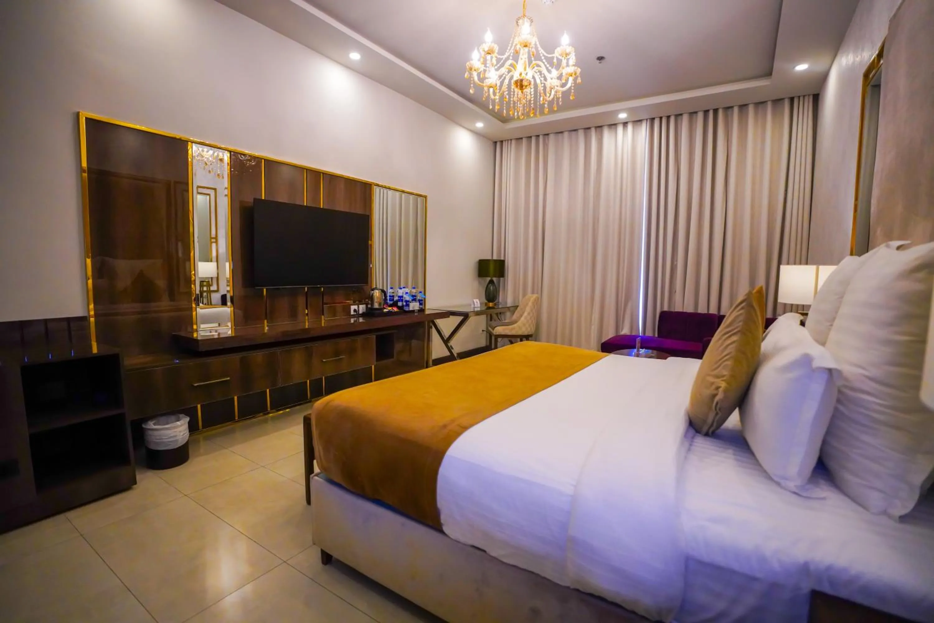 Bed in IFQ Hotel & Resort Islamabad