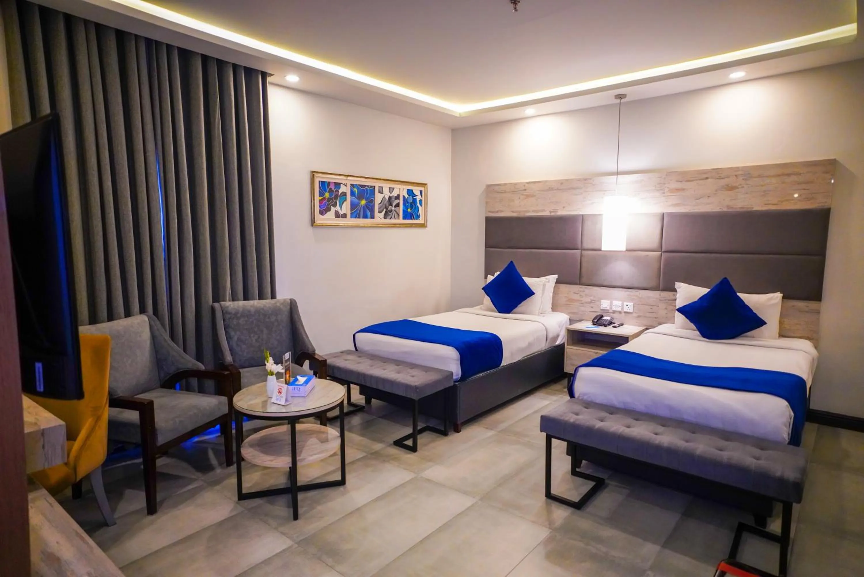 Bed in IFQ Hotel & Resort Islamabad