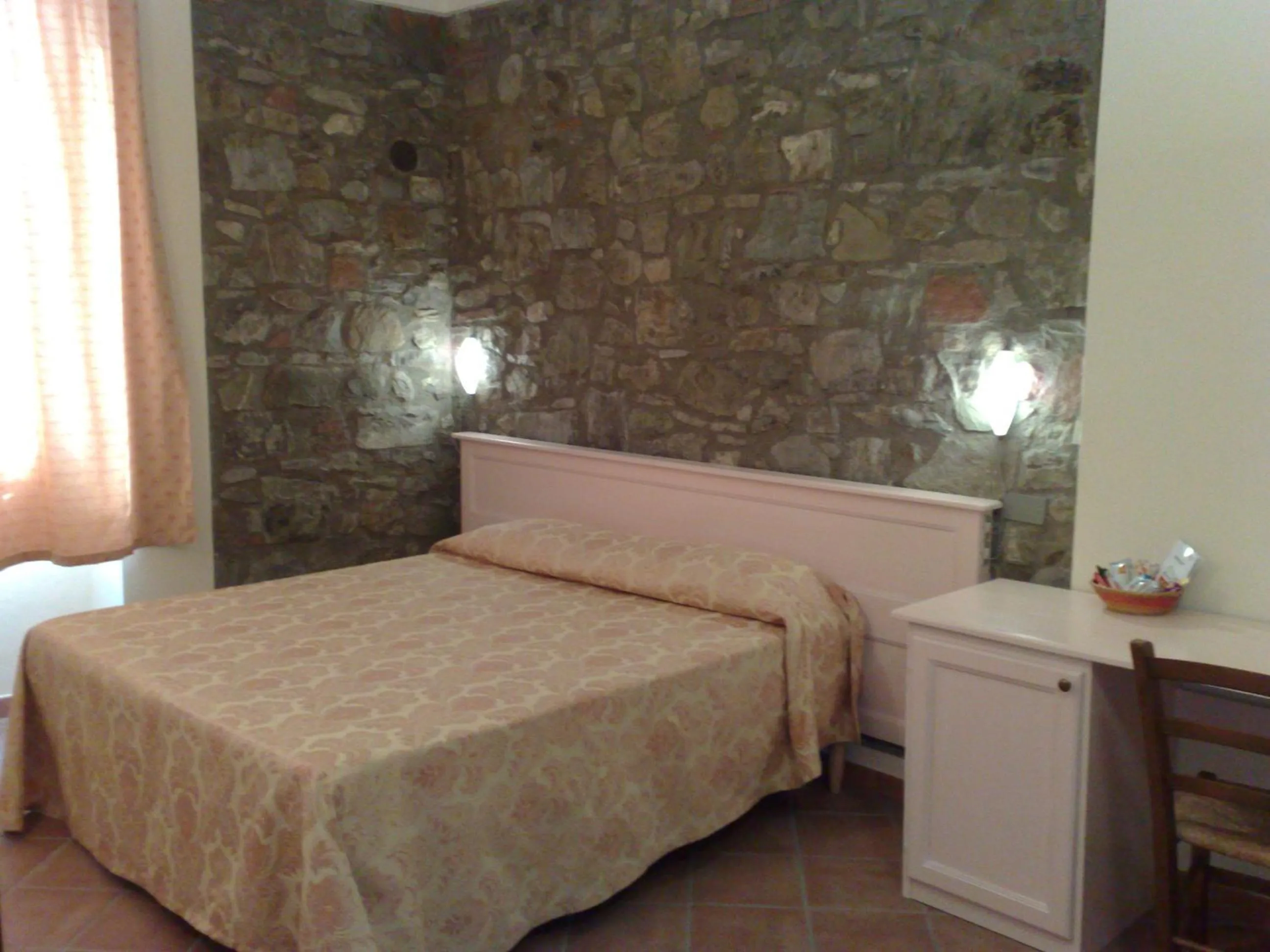 Bedroom in Locanda Il Gallo