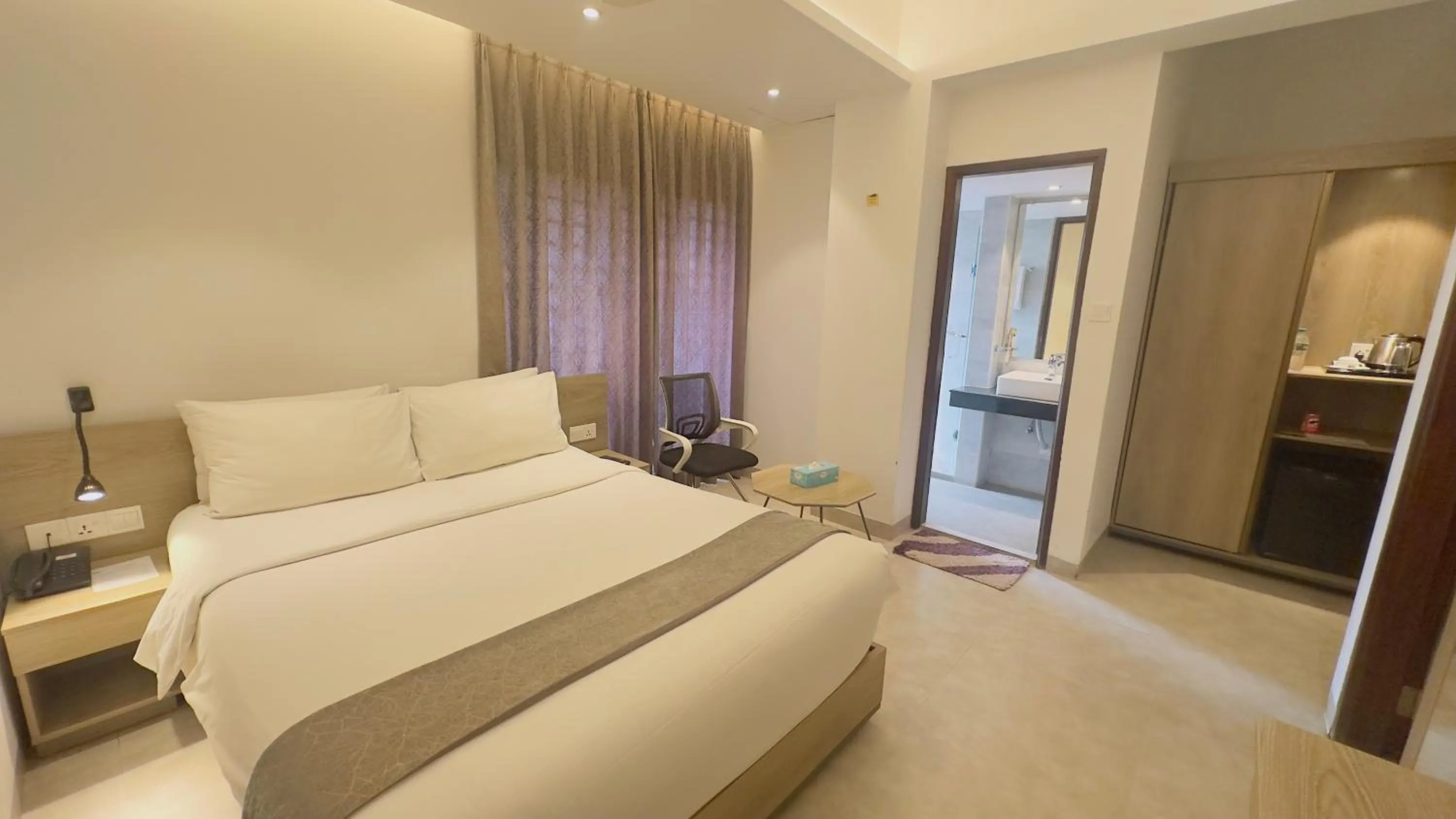 Bed in Priyo Nibash Stylish Residential Hotel
