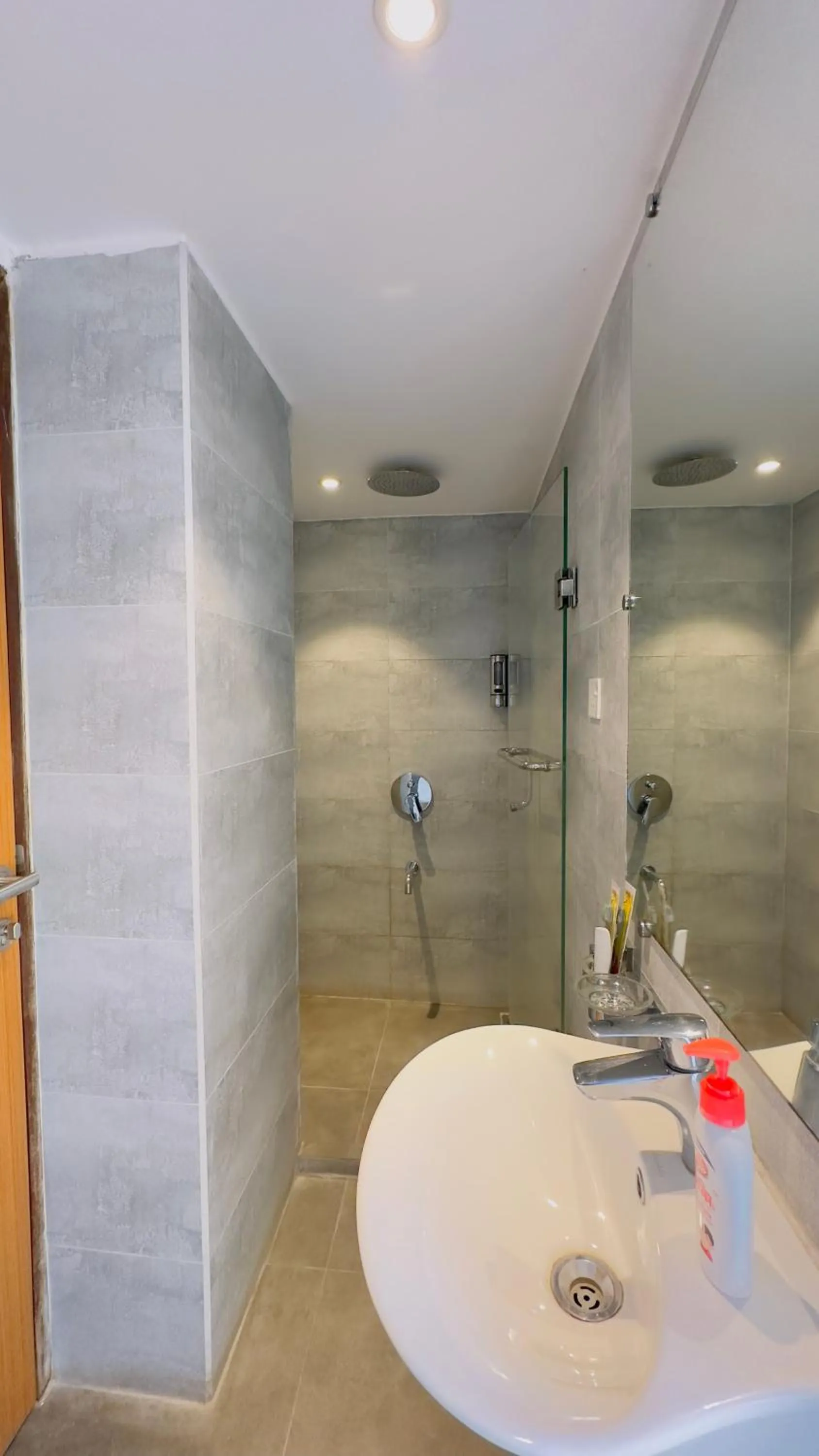Shower in Priyo Nibash Stylish Residential Hotel