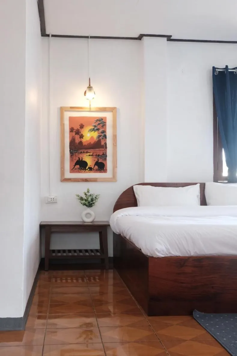 Bed in Sabaydee Guesthouse