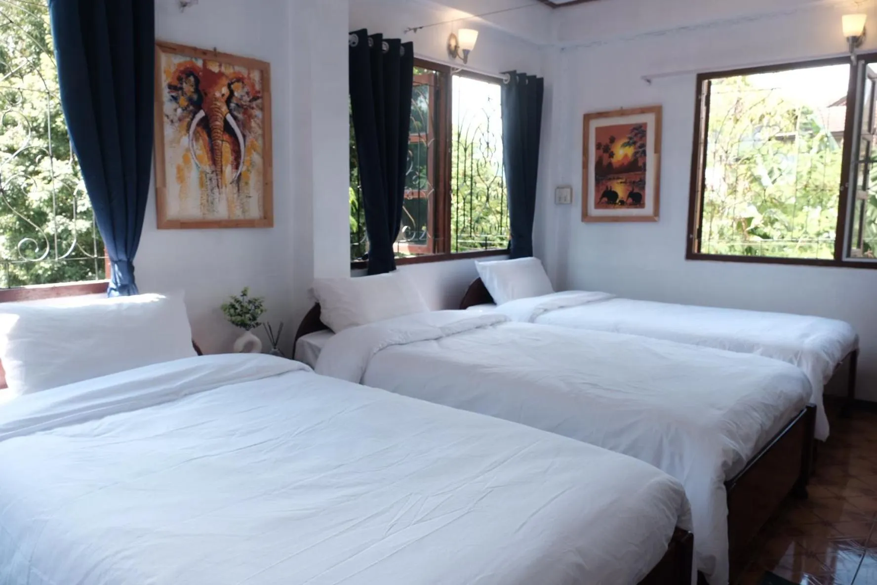 Bed in Sabaydee Guesthouse