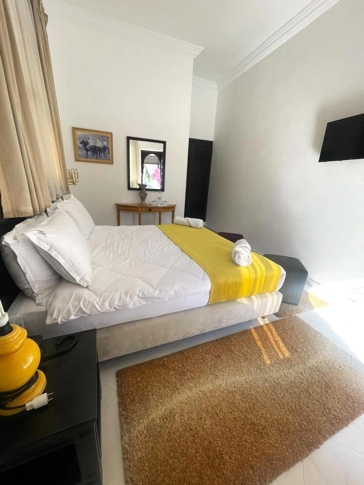 Bed in Majorel Perle Hôtel Riad Restaurant Picine & Spa