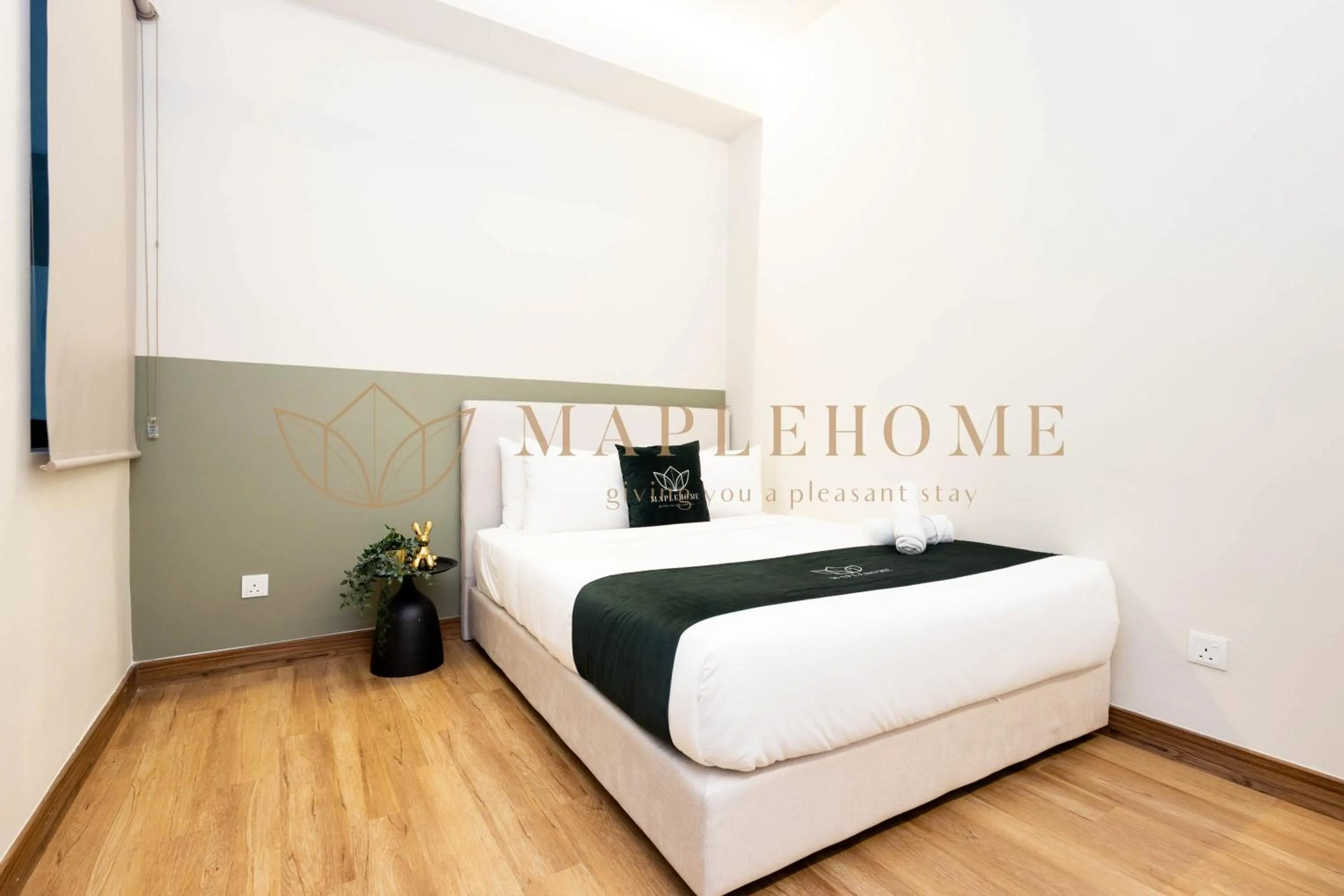 Bed in The Apple Premier Suites Melaka