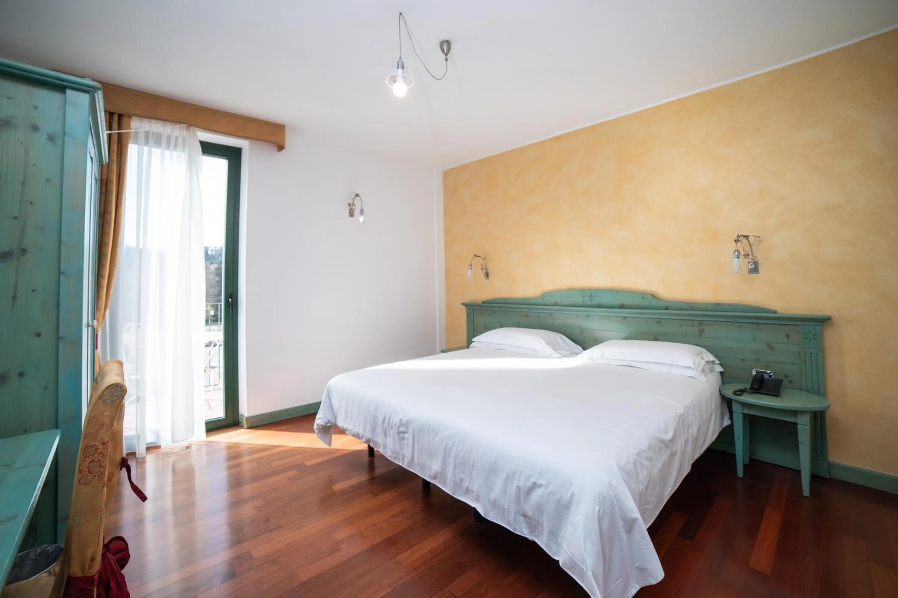 Bed in Hotel Residence Montelago