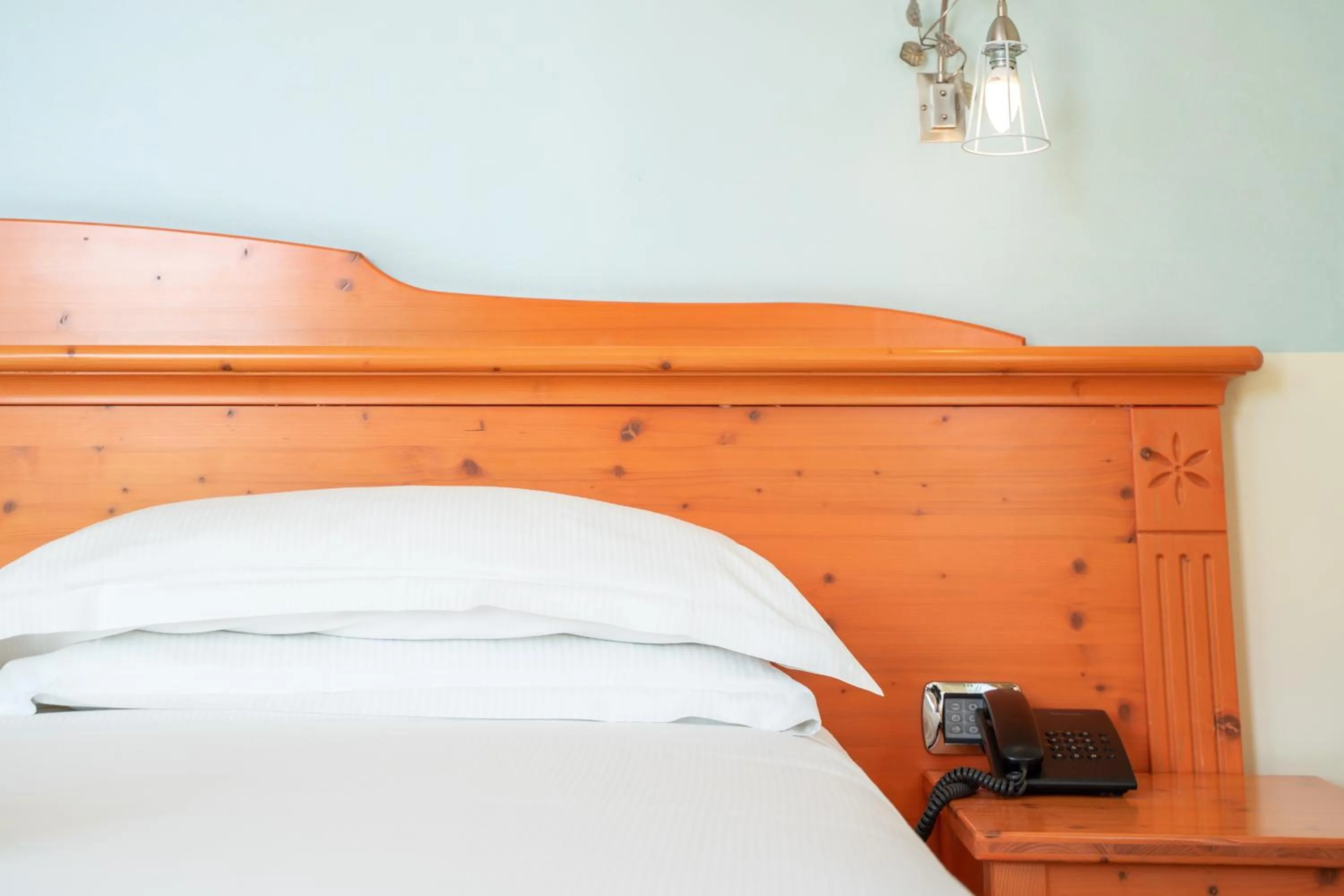 Bed in Hotel Residence Montelago