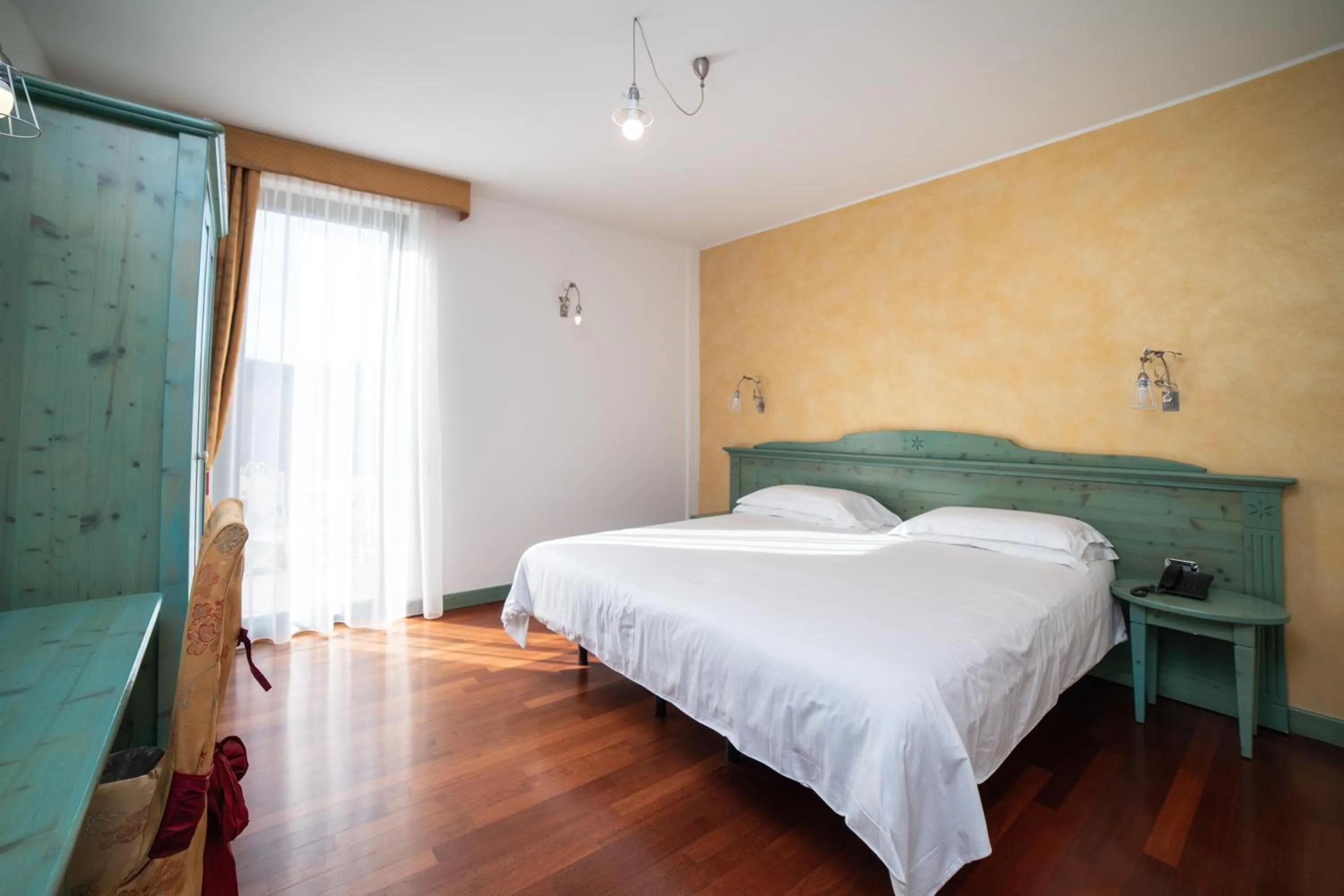 Bed in Hotel Residence Montelago