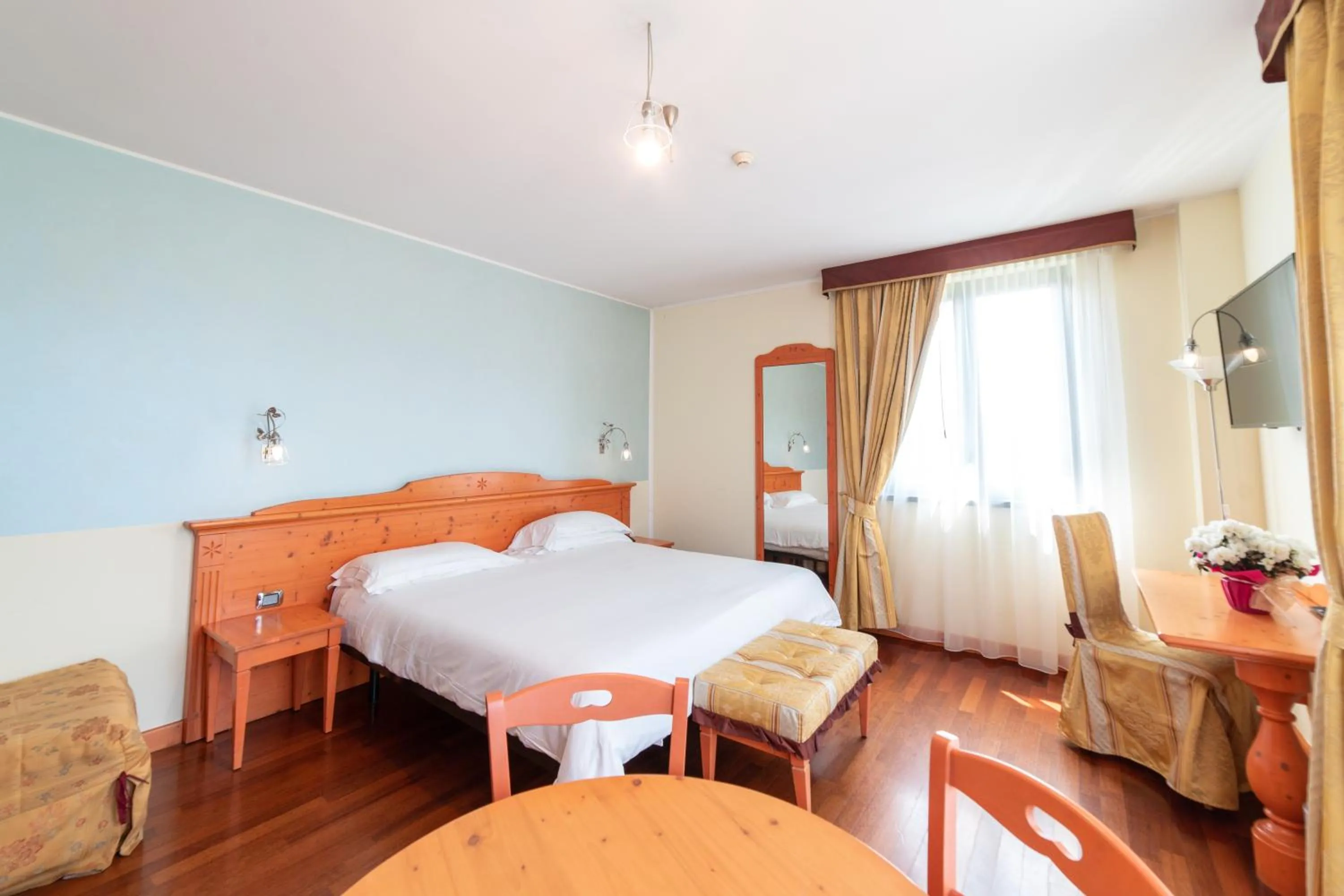 Bed in Hotel Residence Montelago