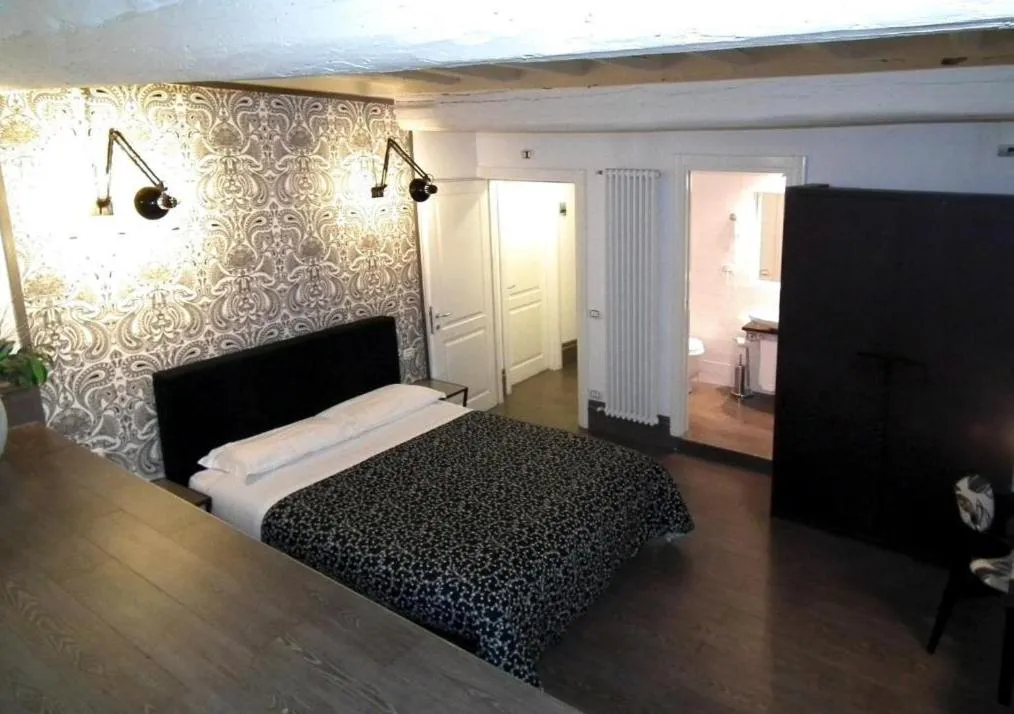 Bed in Locanda degli Antiquari