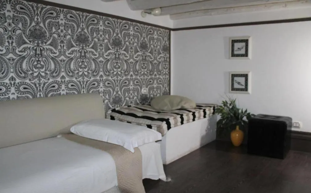 Bed in Locanda degli Antiquari