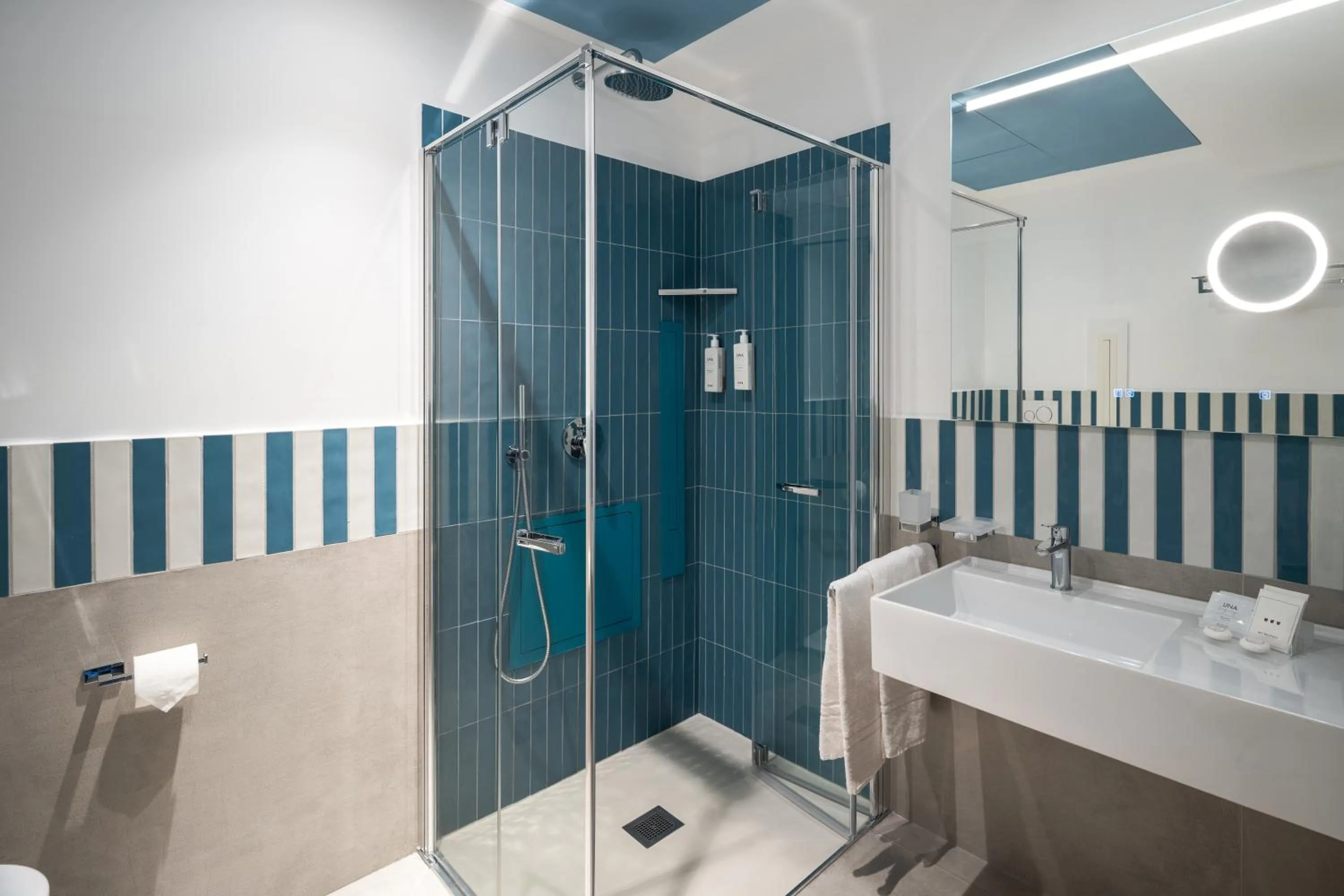 Bathroom in UNA Hotels Naxos Beach Sicilia