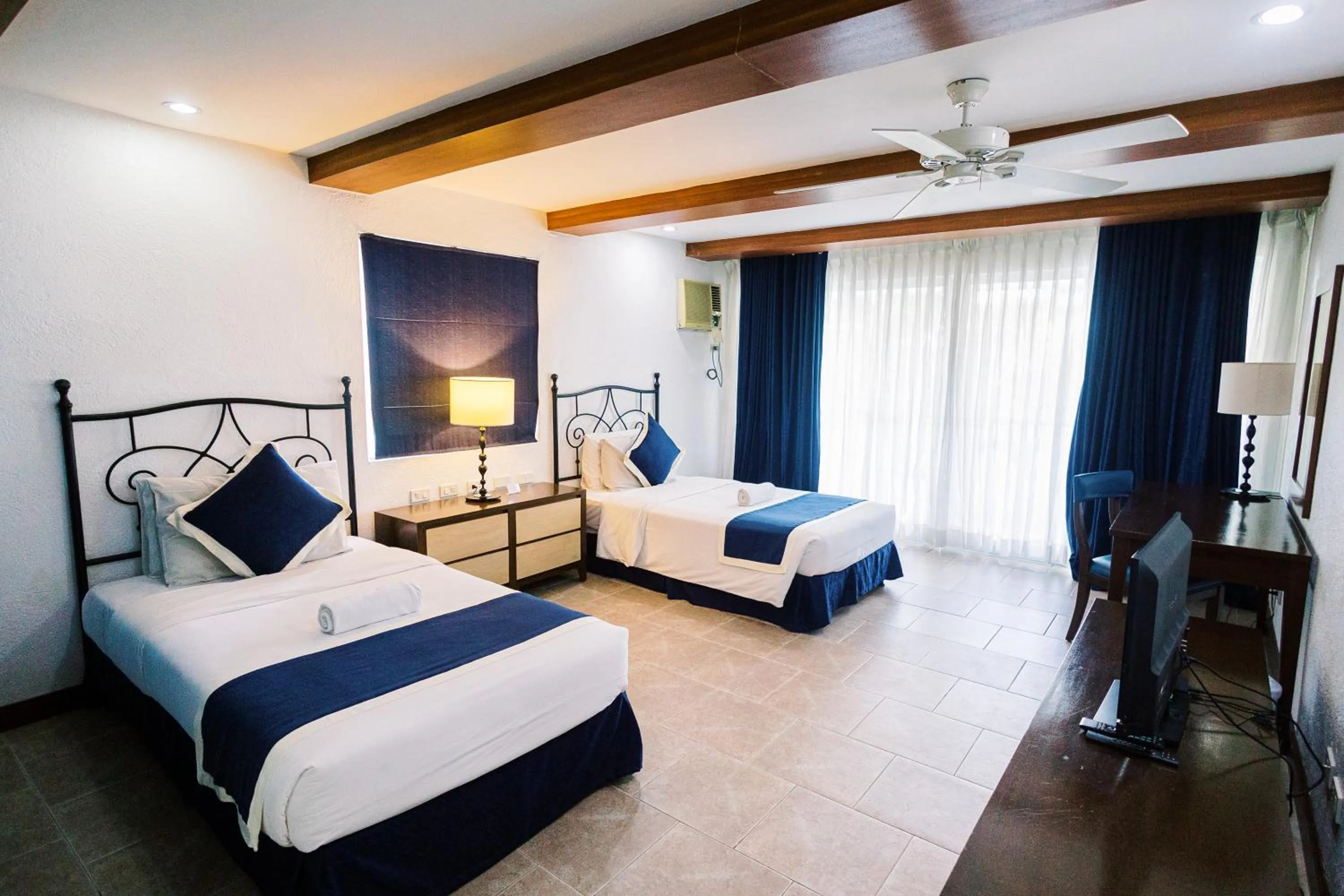 Bed in Estancia Resort Hotel