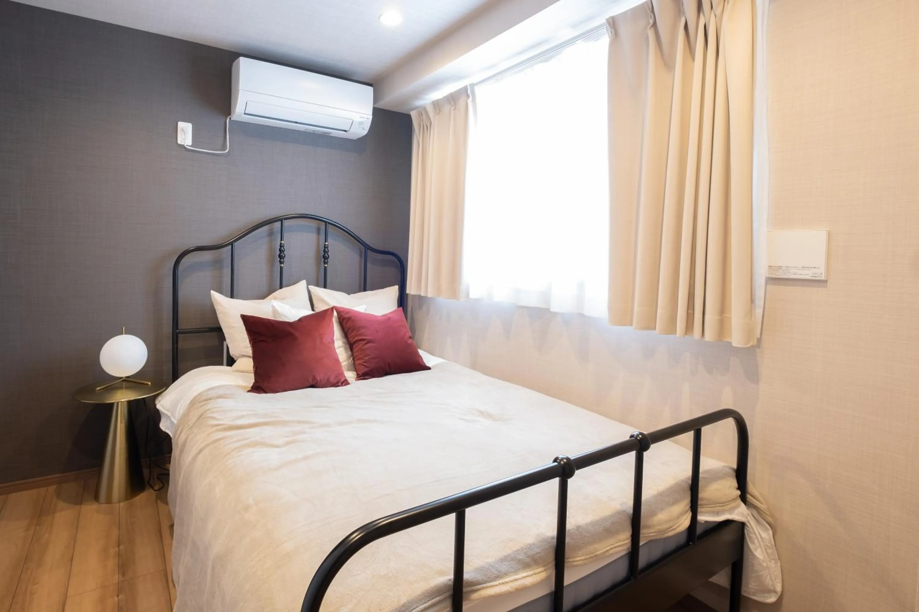 Bed in Ken's Place麻布East