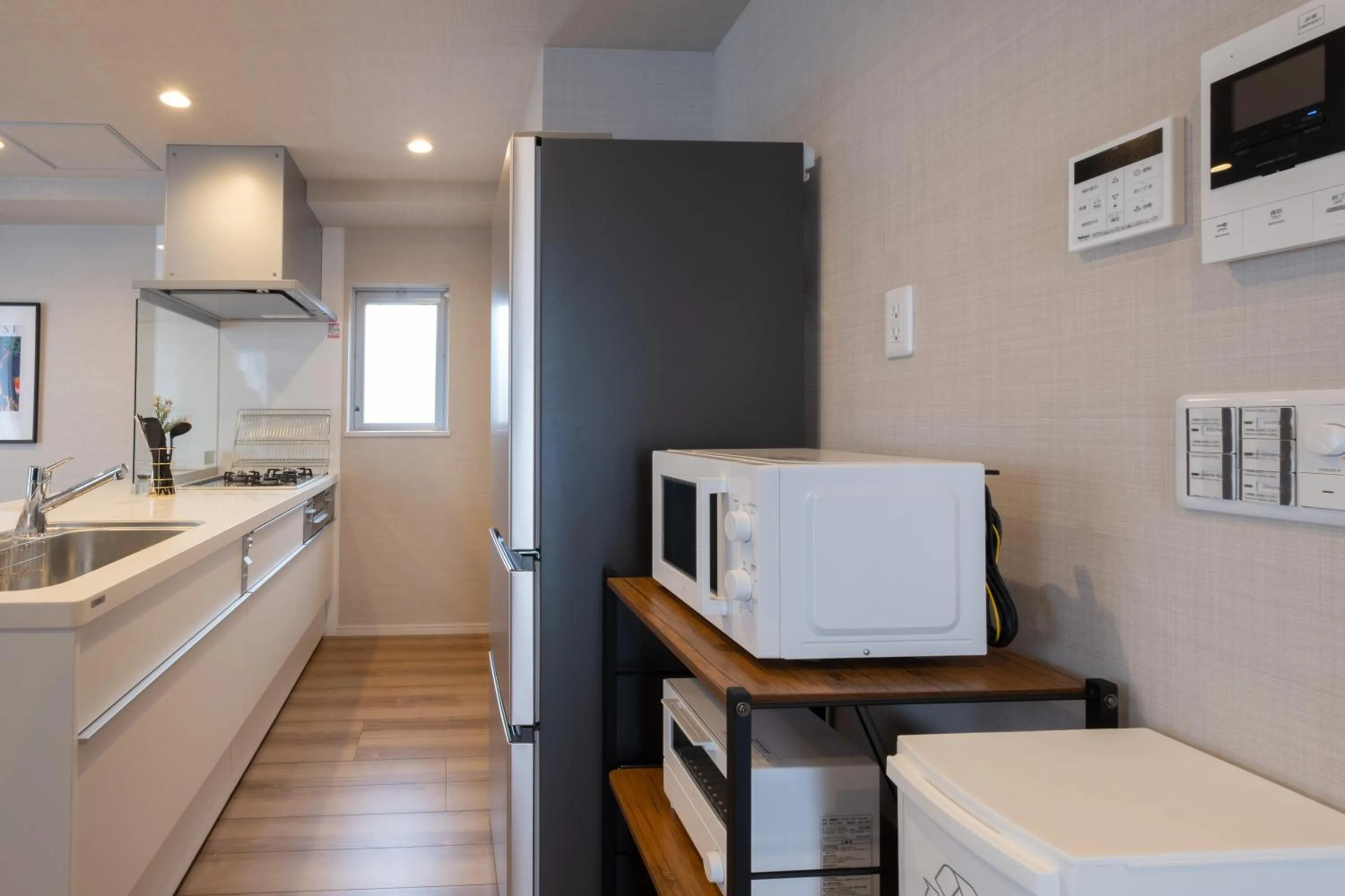 Kitchen or kitchenette in Ken's Place麻布East