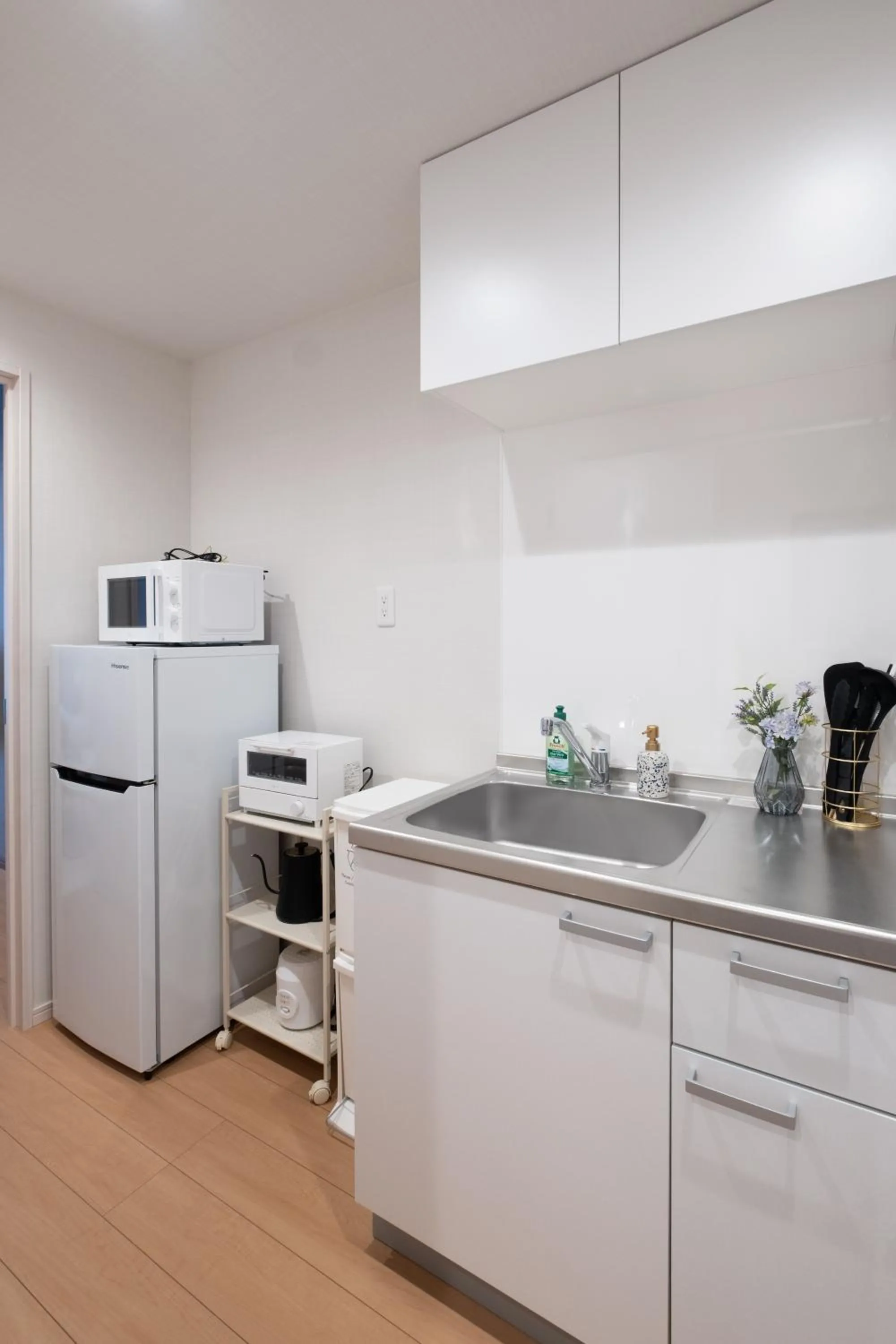 Kitchen or kitchenette in Ken's Place麻布East