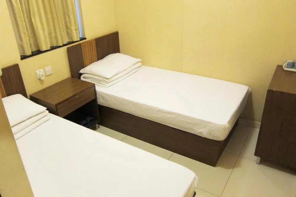 Bed in Wai fan Guest house