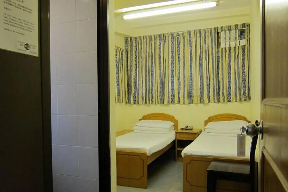 Bed in Wai fan Guest house