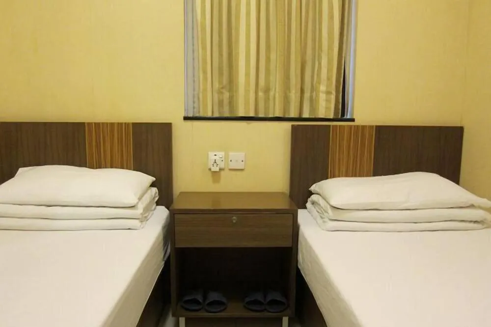 Bed in Wai fan Guest house