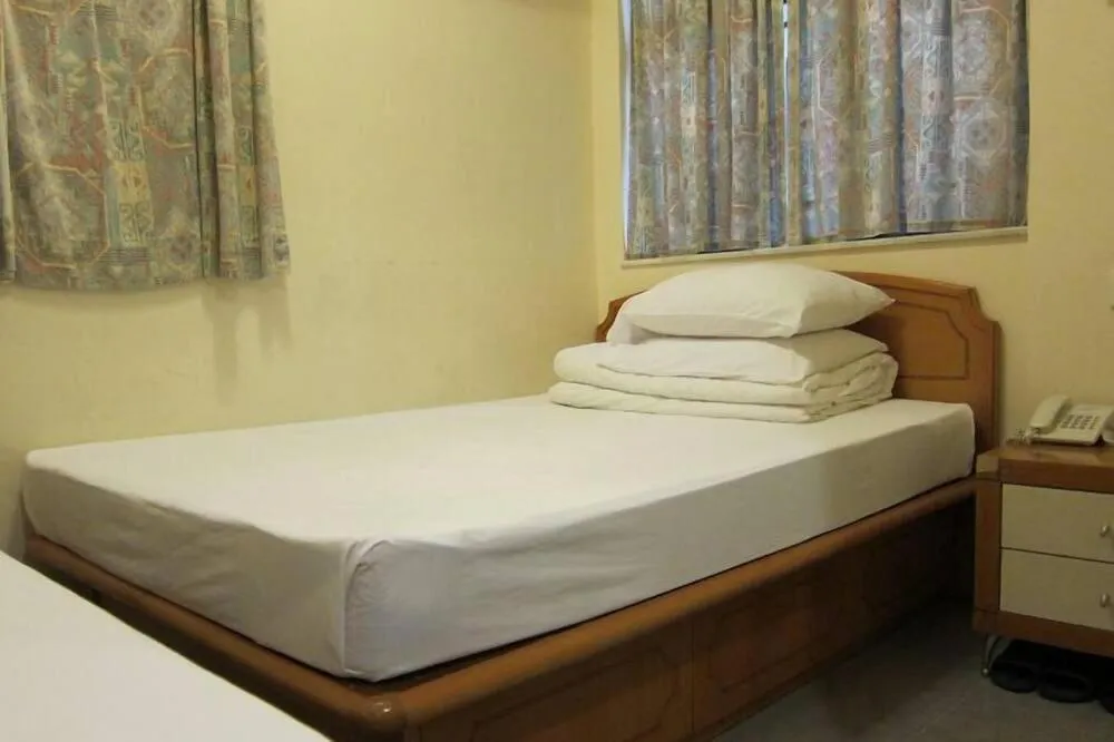 Bed in Wai fan Guest house