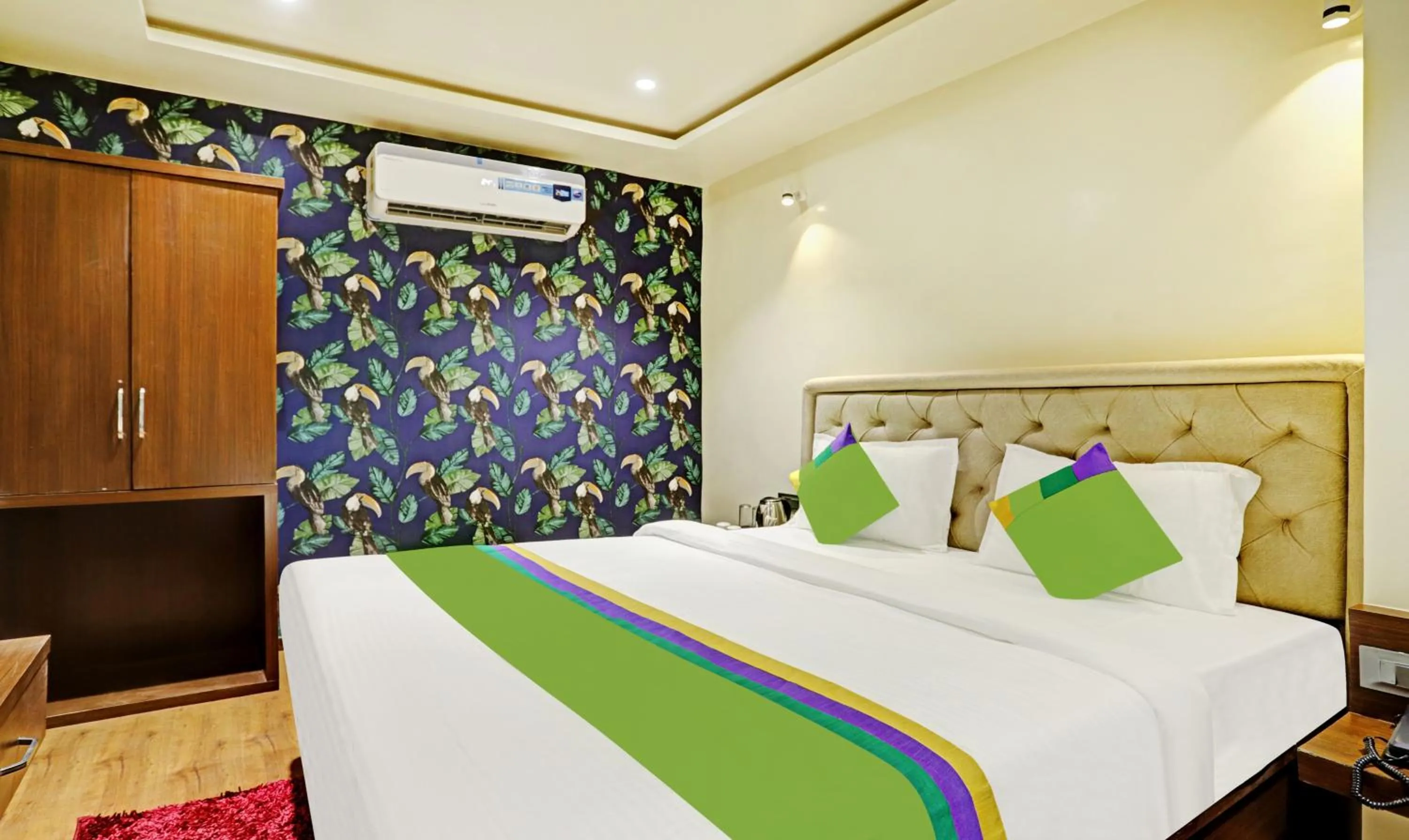 Bedroom, Bed in Treebo Risha