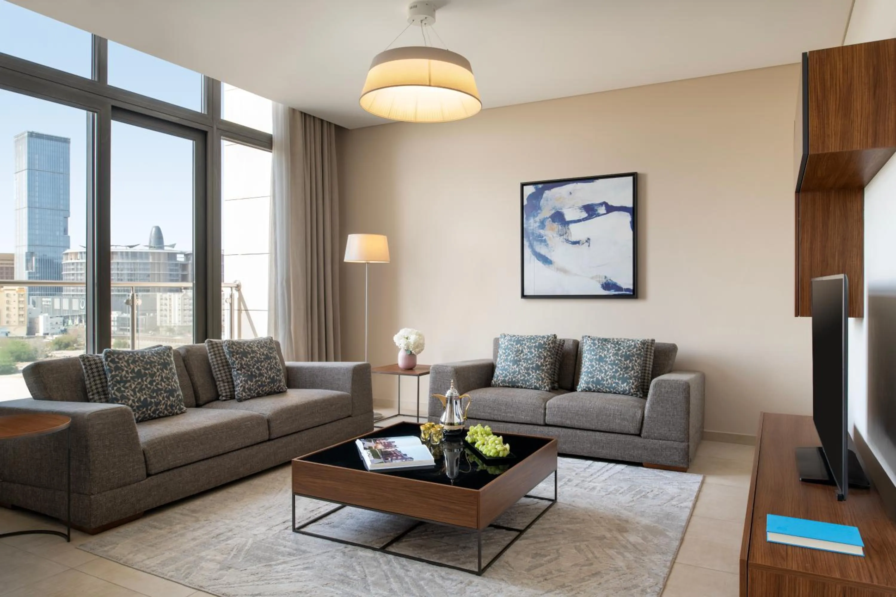 Communal lounge/ TV room in Marriott Executive Apartments Doha, Le Mirage City Walk